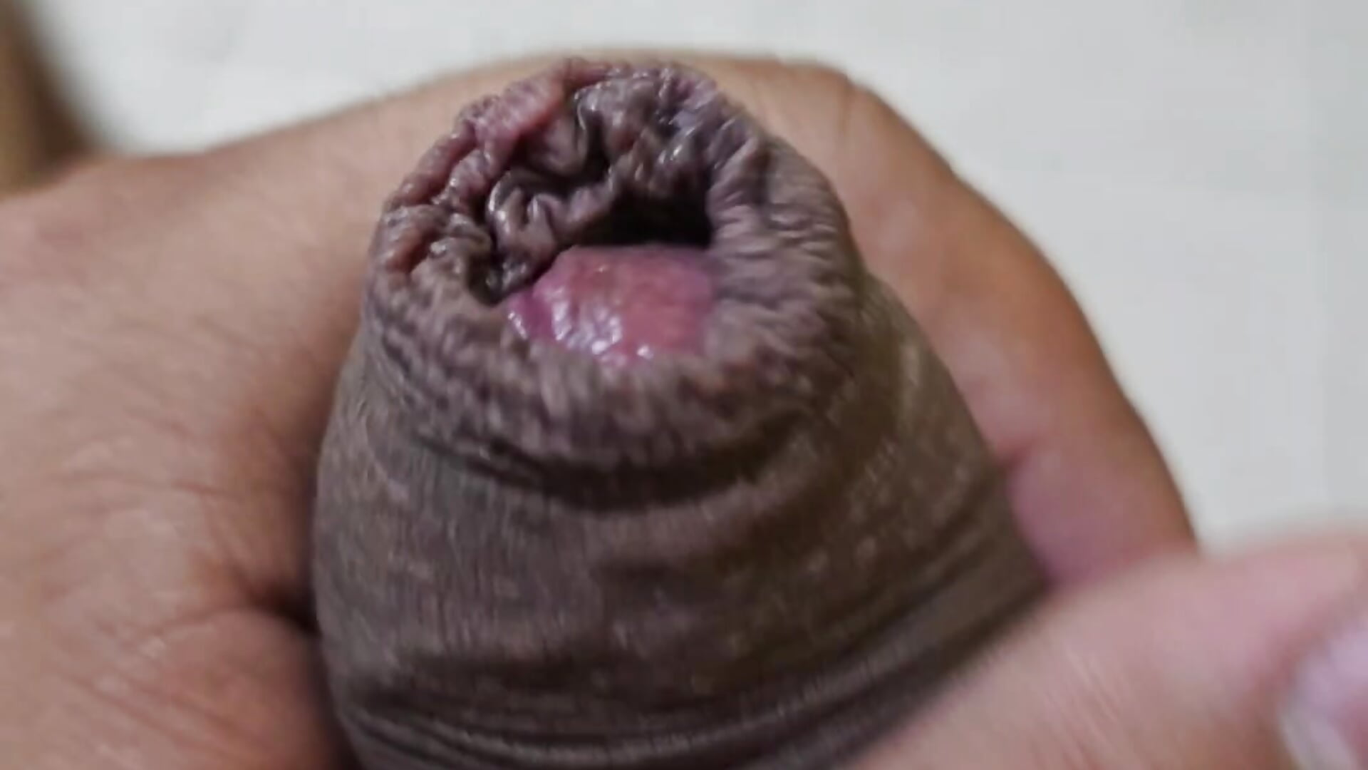 Masturbating