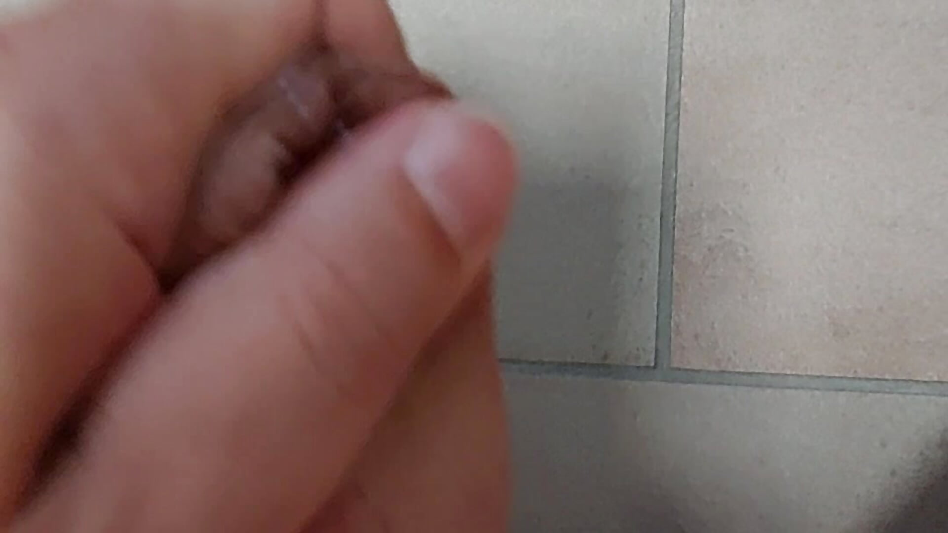 Sticky cum on Bathroom floor