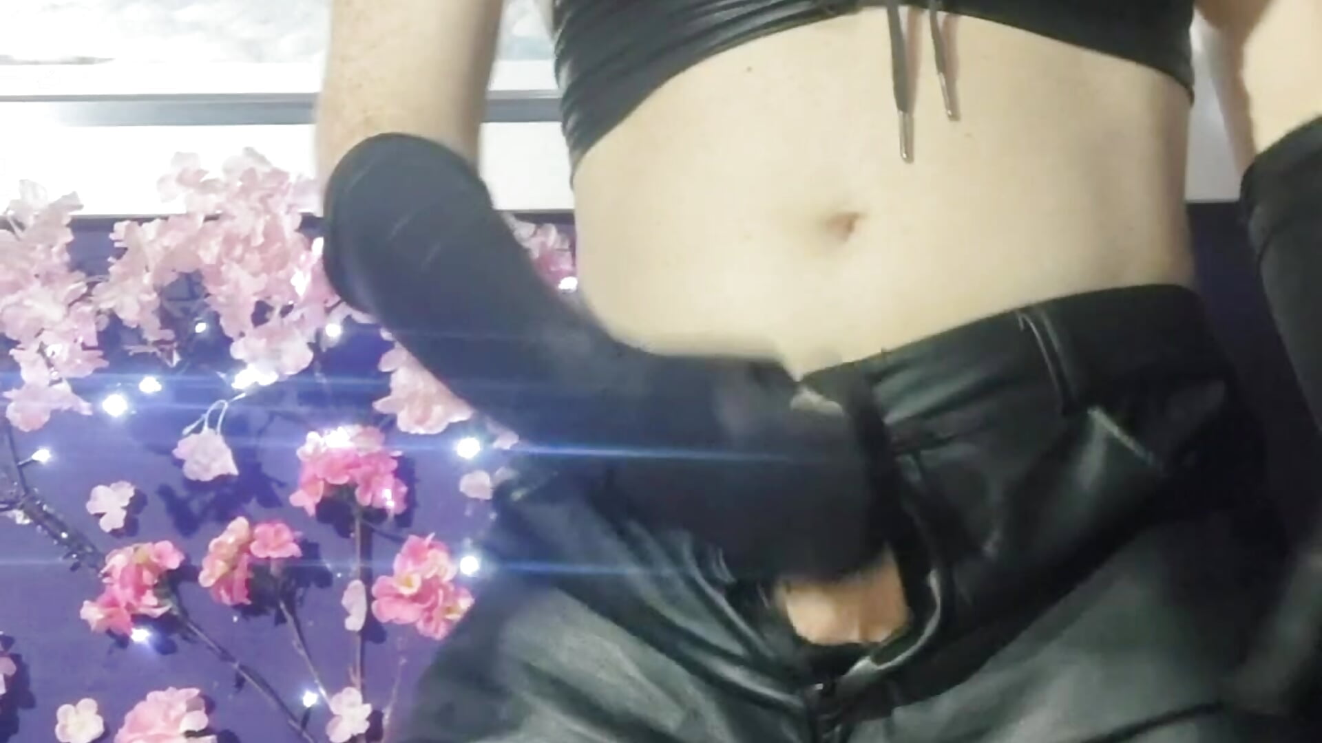 Makenzie, dressed in leather pants, leather gloves, and beautiful makeup, dances very sexily, mastur