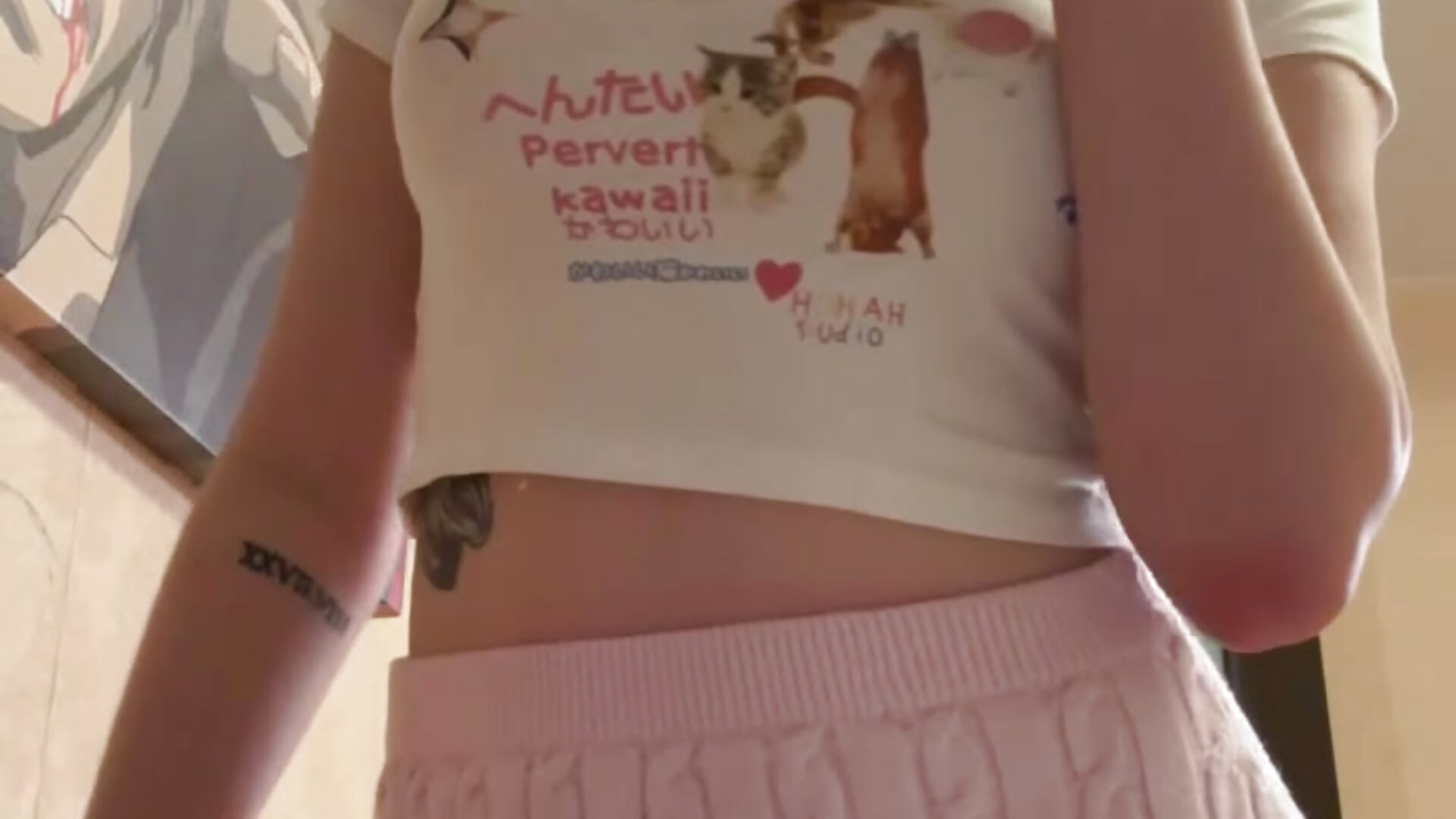 A woman looking seductively at the camera during a cam show