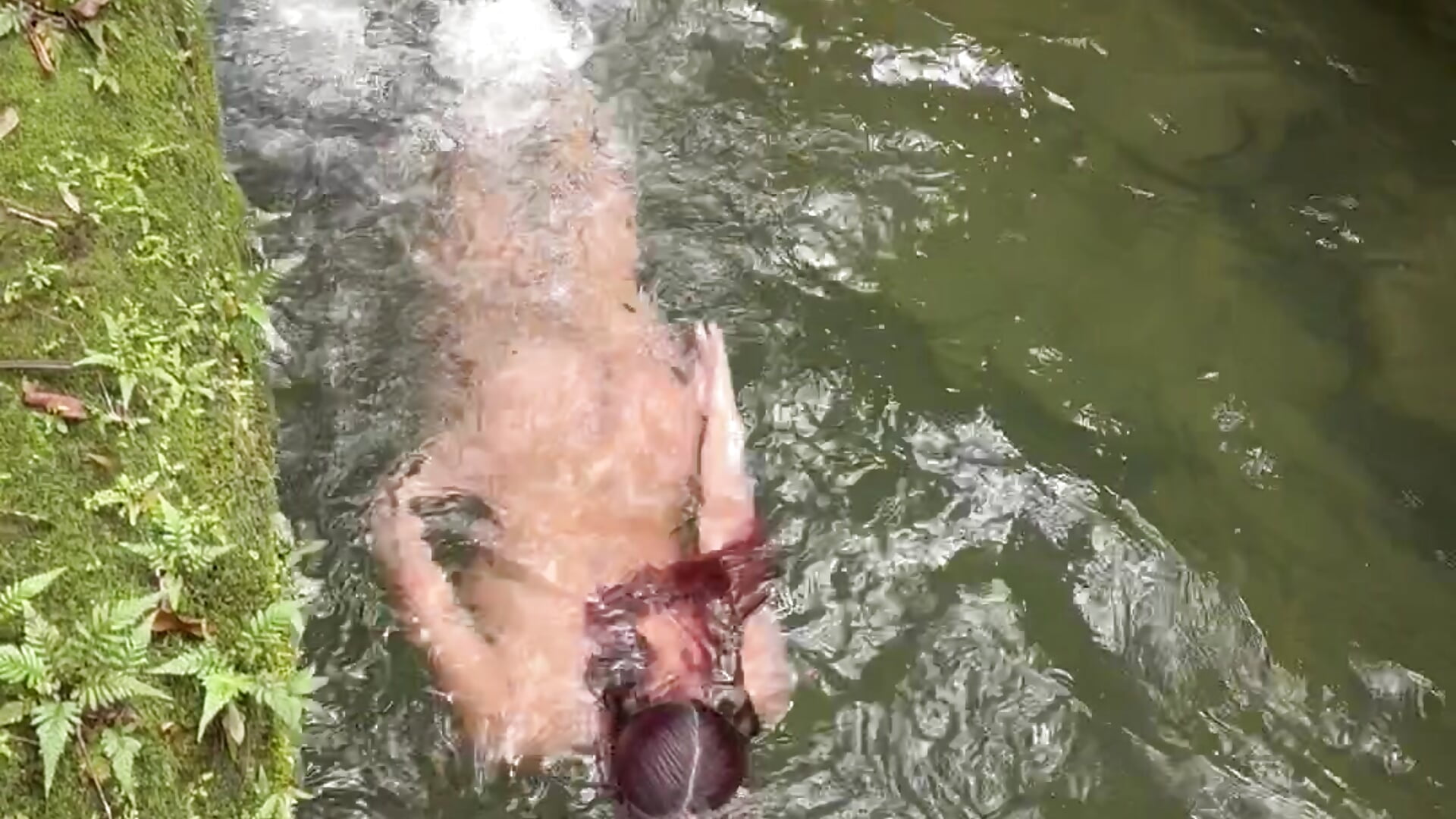 Naked in the river