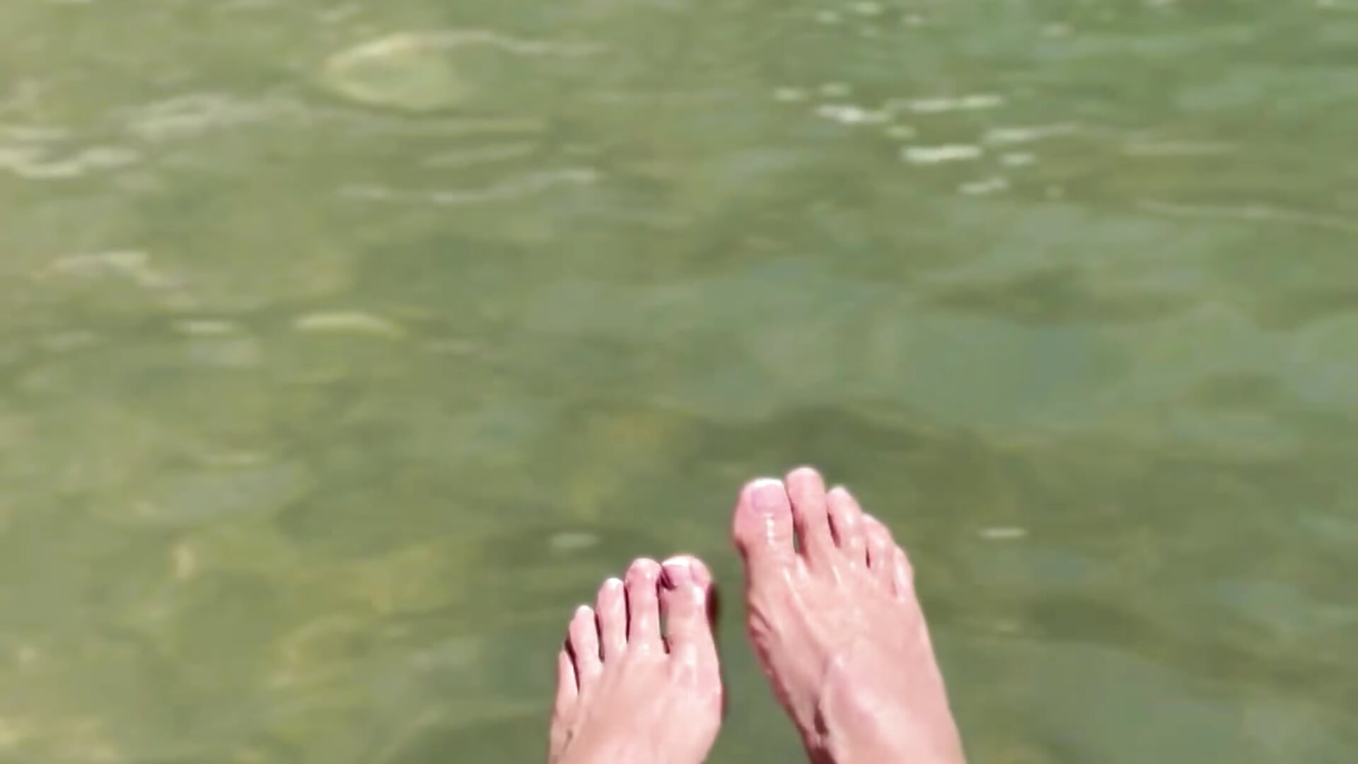 Feet in the river