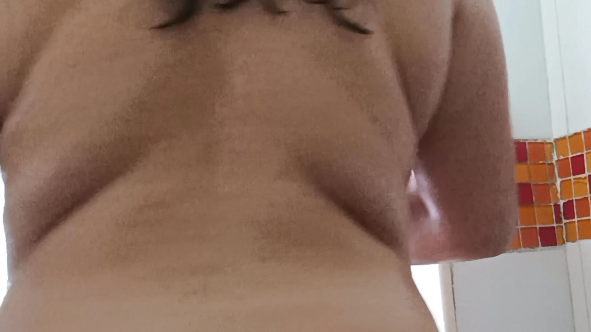 A hairy mom in the shower