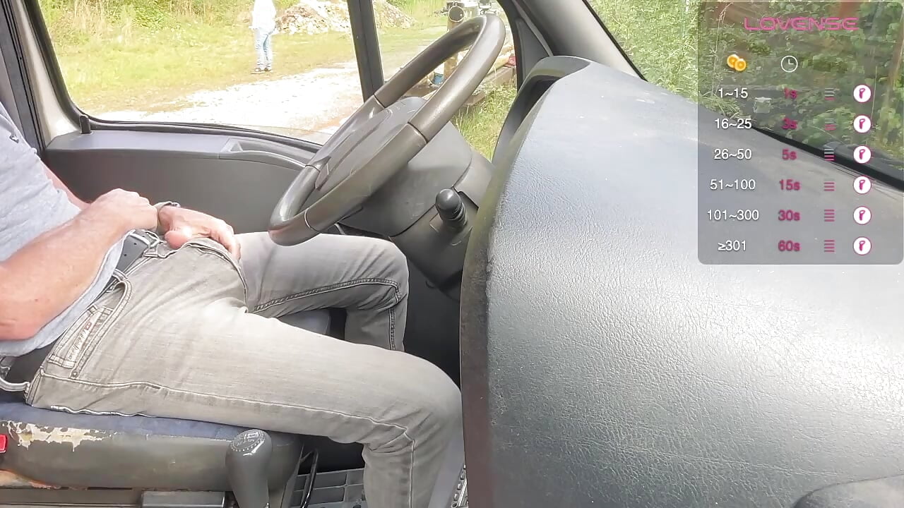 a guy shows off his big cock while driving his truck and i go see it