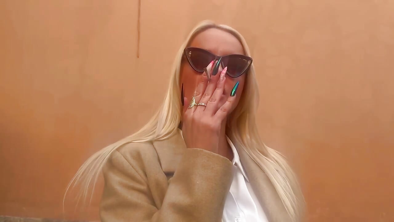 Mistress smokes cigarettes