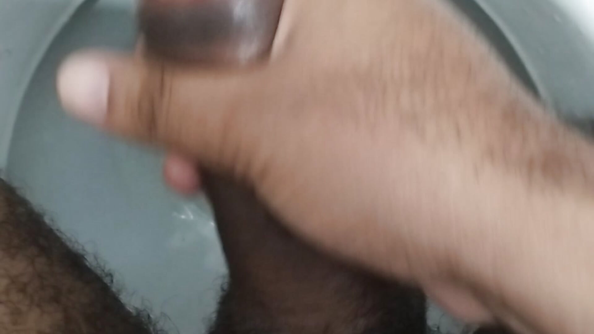 cumming in the public bathroom