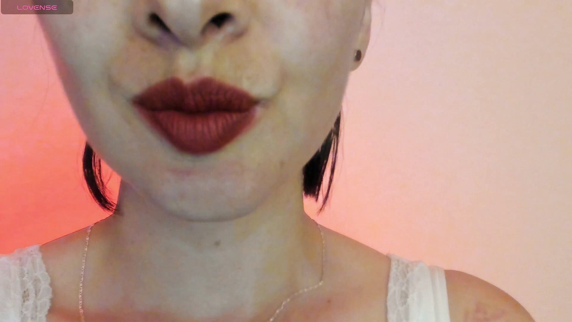 red lipstick and Latex gloves