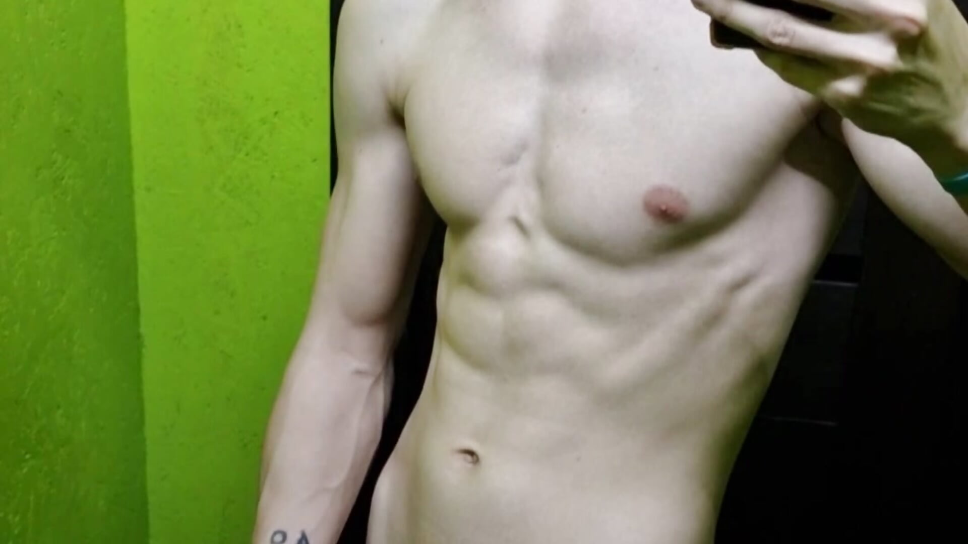 Jerking off and cumming in a gym locker room