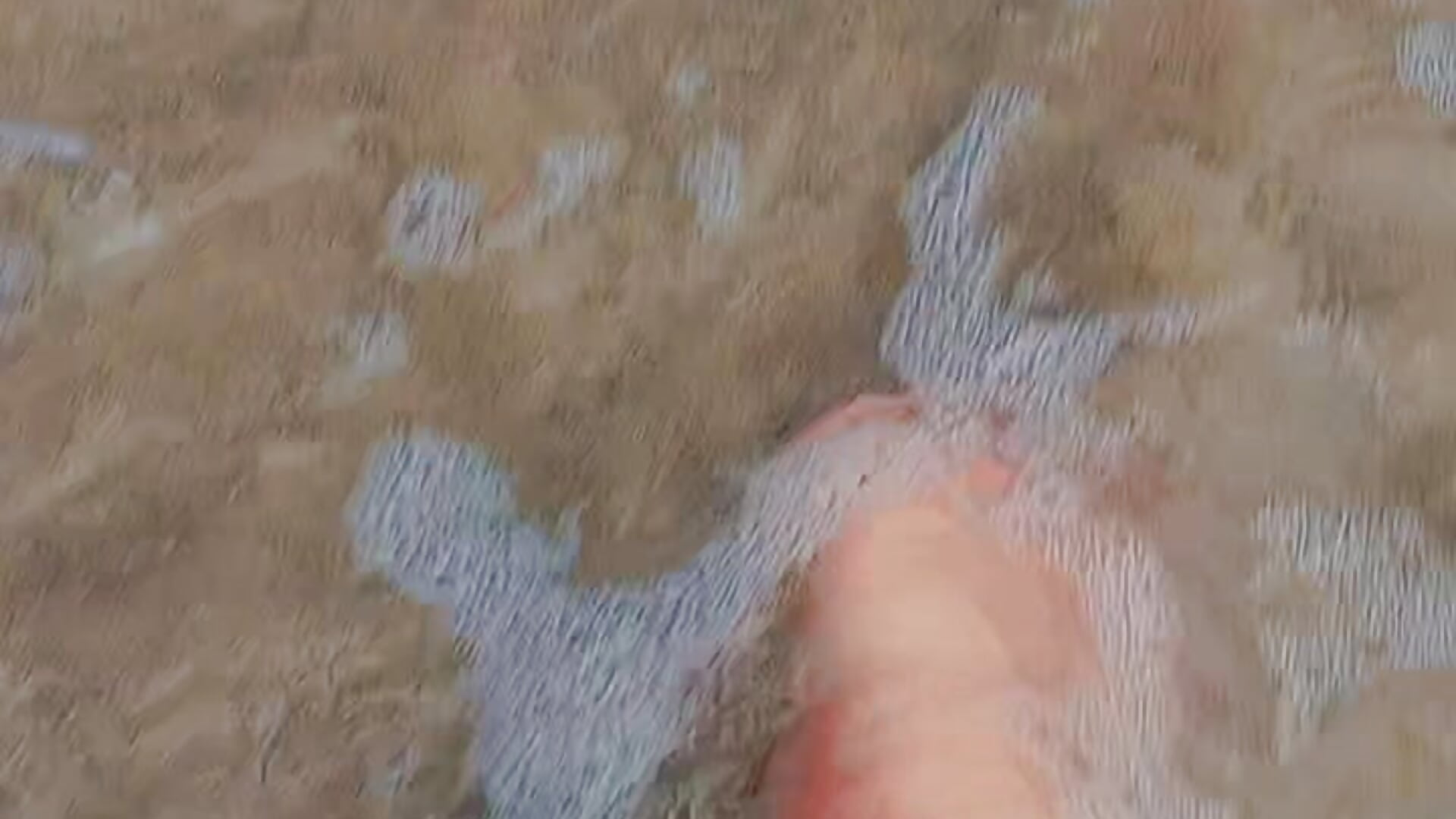 Well, when you're wet on the beach with sea water, you can see the soles of your feet.