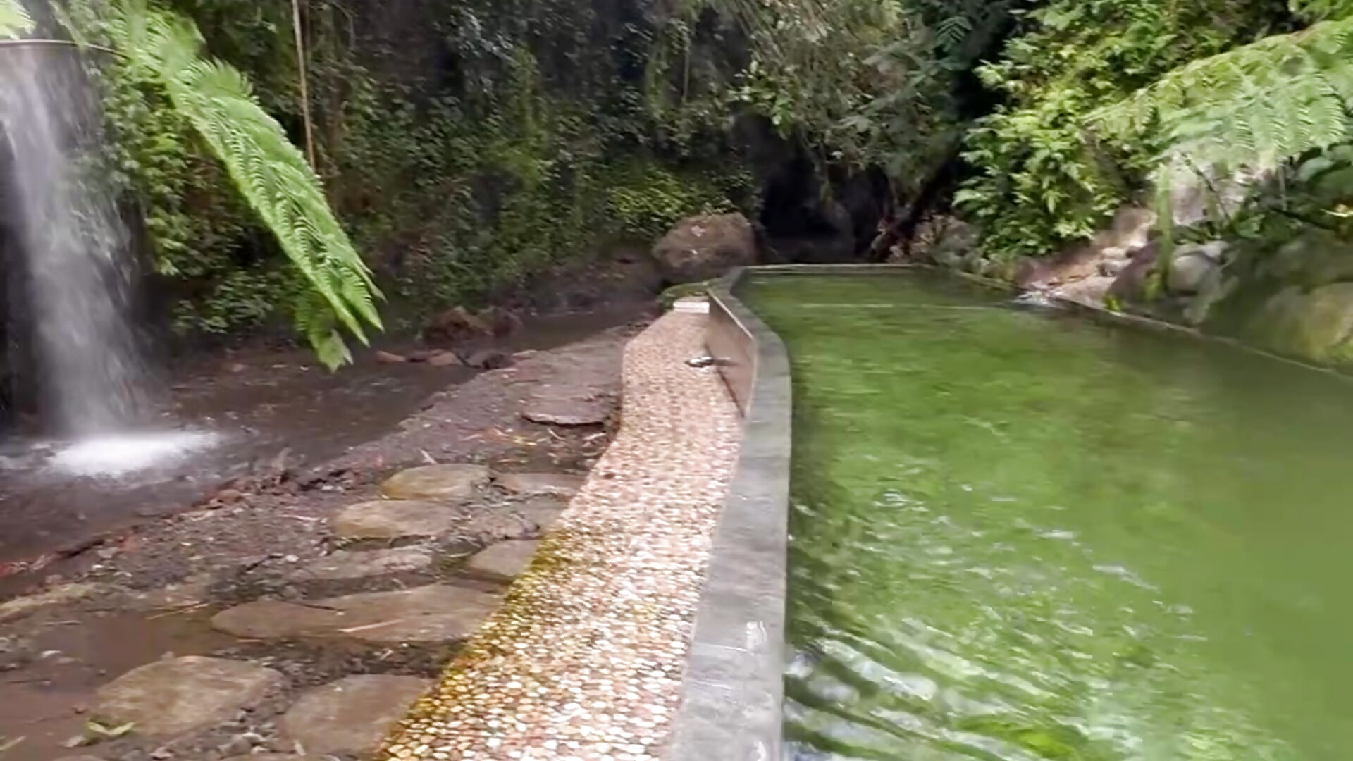 Pool by the waterfall