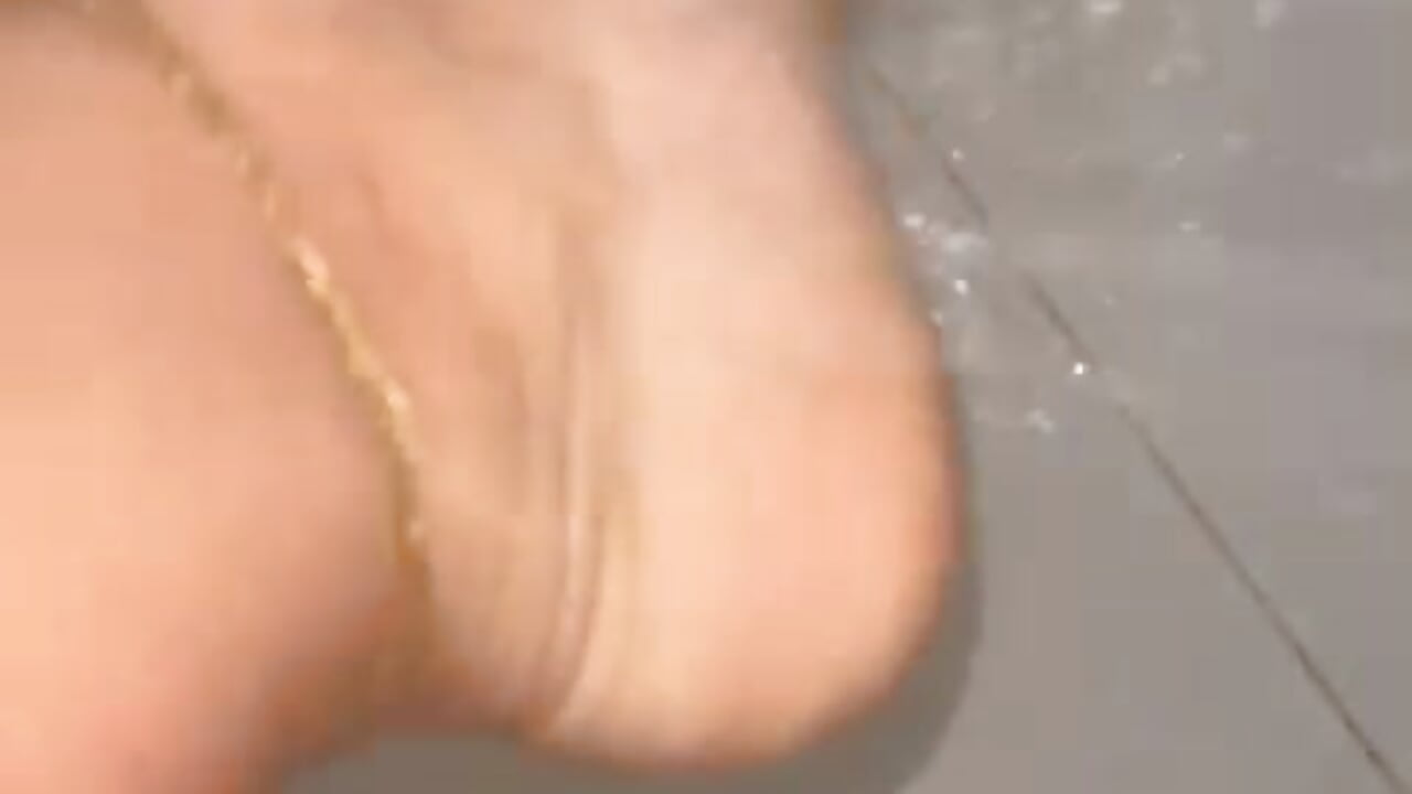Under the shower, every drop teases my skin while my feet turn into pure temptation.