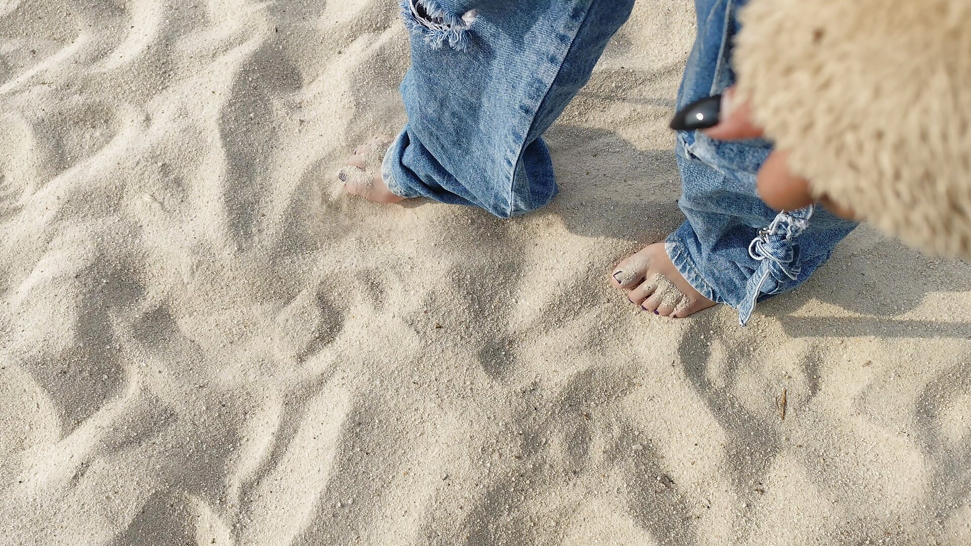 Feet in the sand