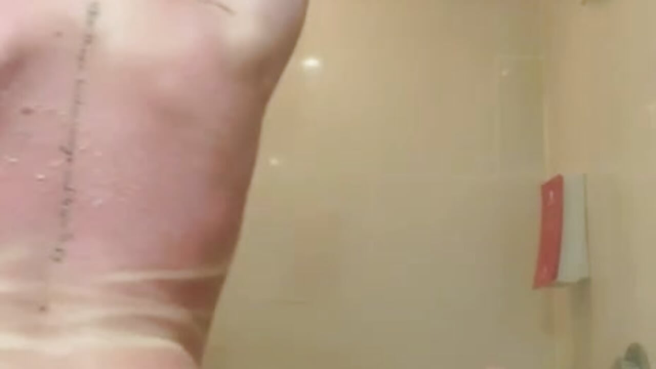 Completely naked in the shower