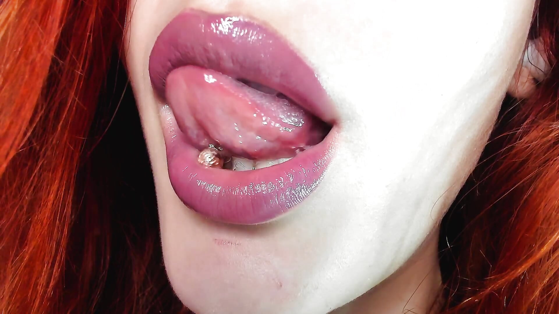 Lipgloss and tongue piercing