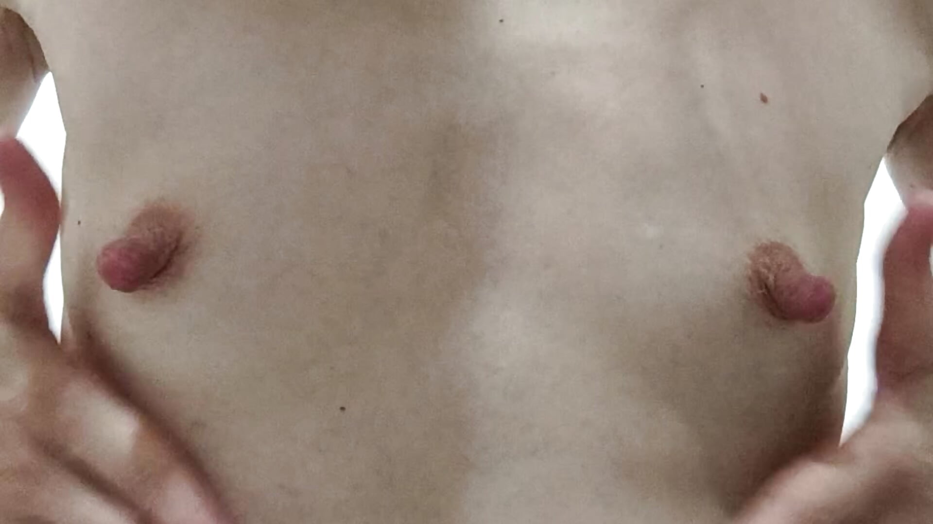 I play with my big erected nipples