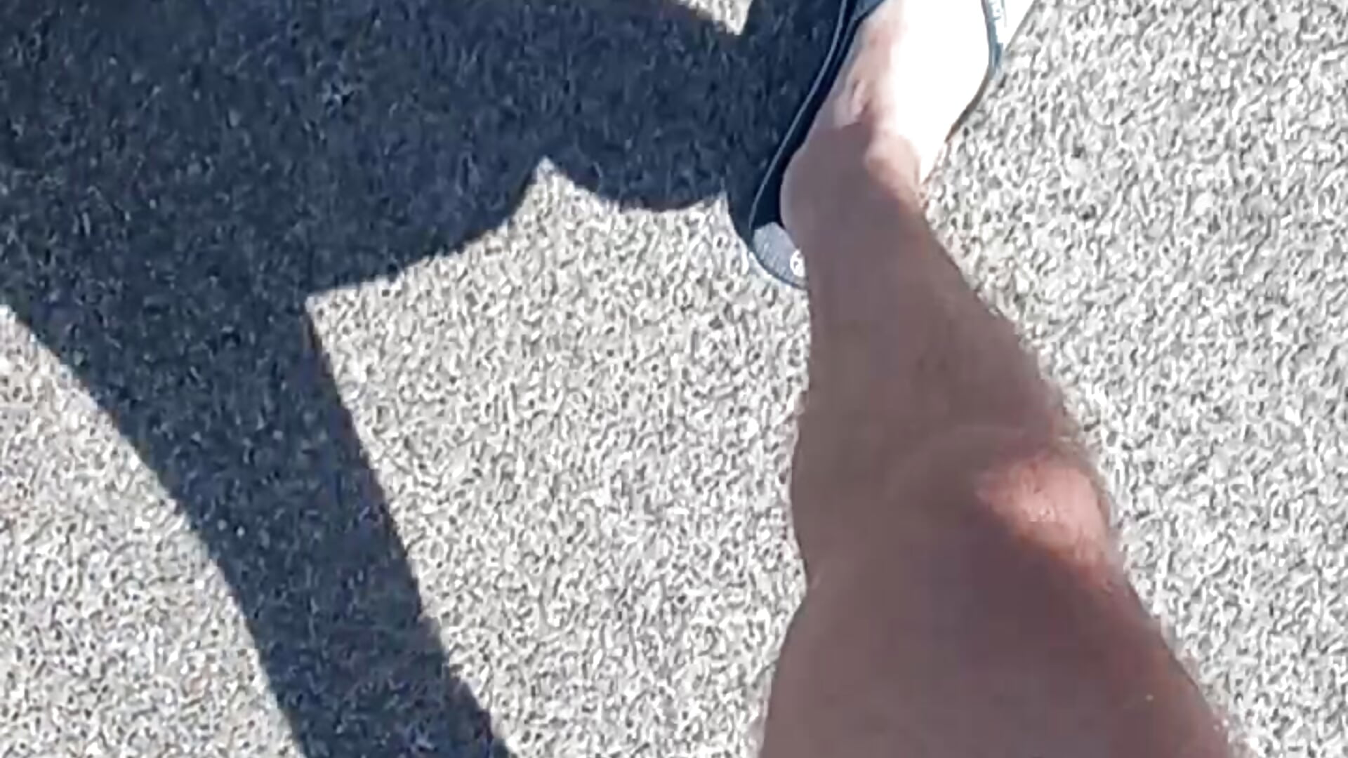 Flip flops and asphalt - video by FeetForTips cam model
