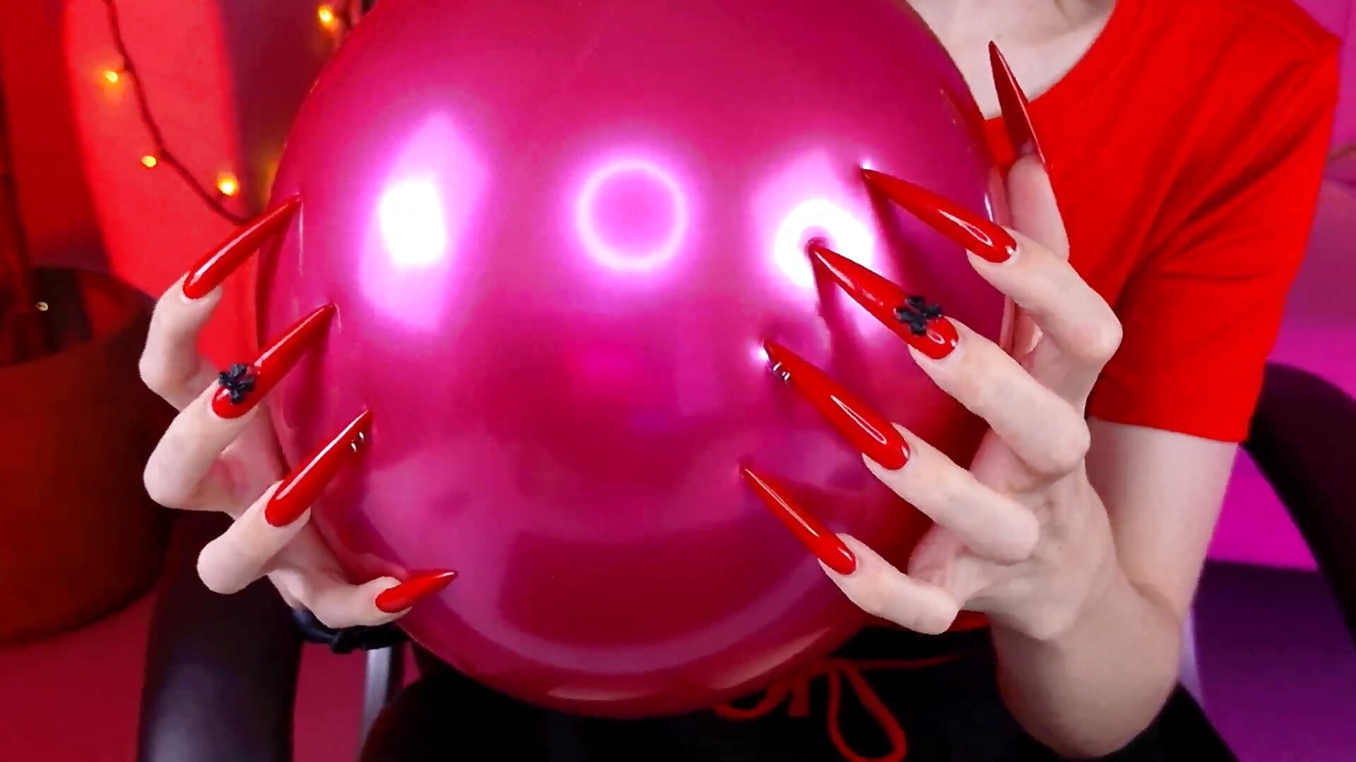 Tina's red nails