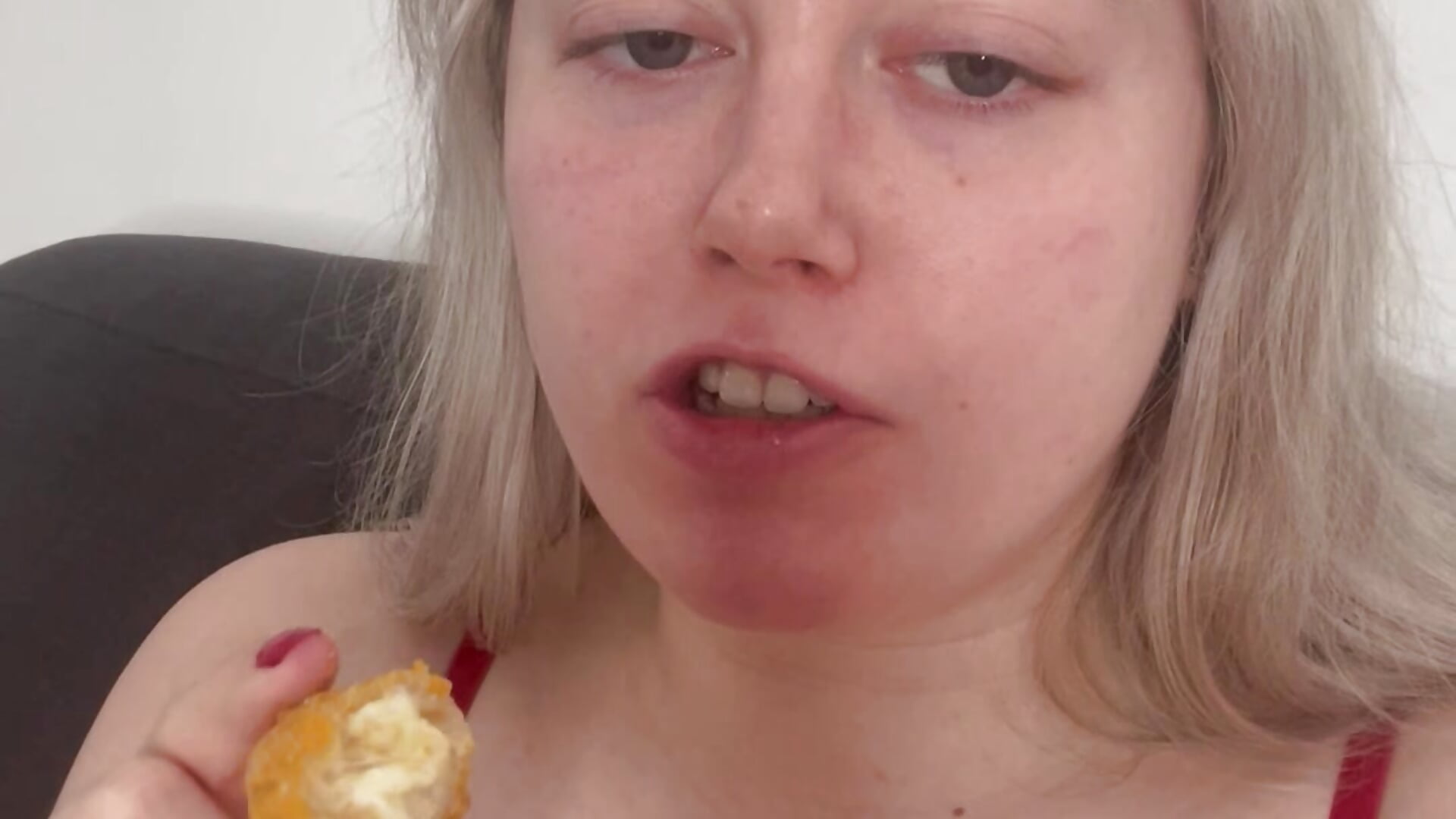 Sensually eating a cheese bite