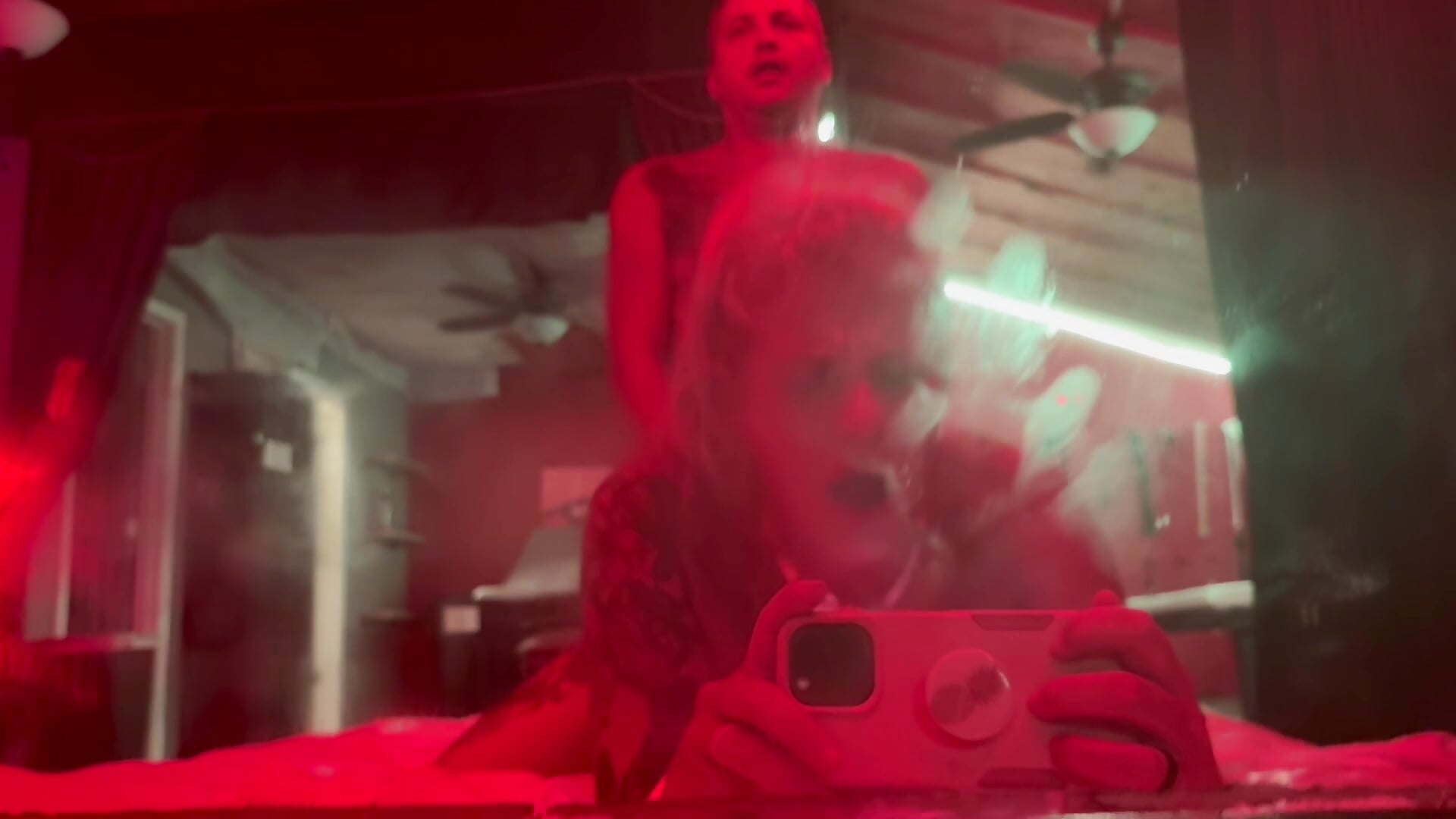 Doggie Style in mirror with Red Lighting of this Swinger Playroom!