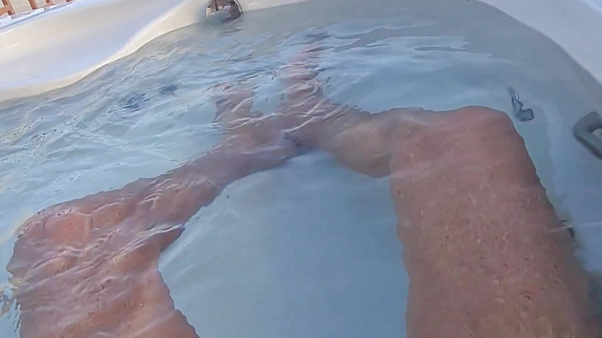 Im Whirpool im Urlaub auf der Dachterasse