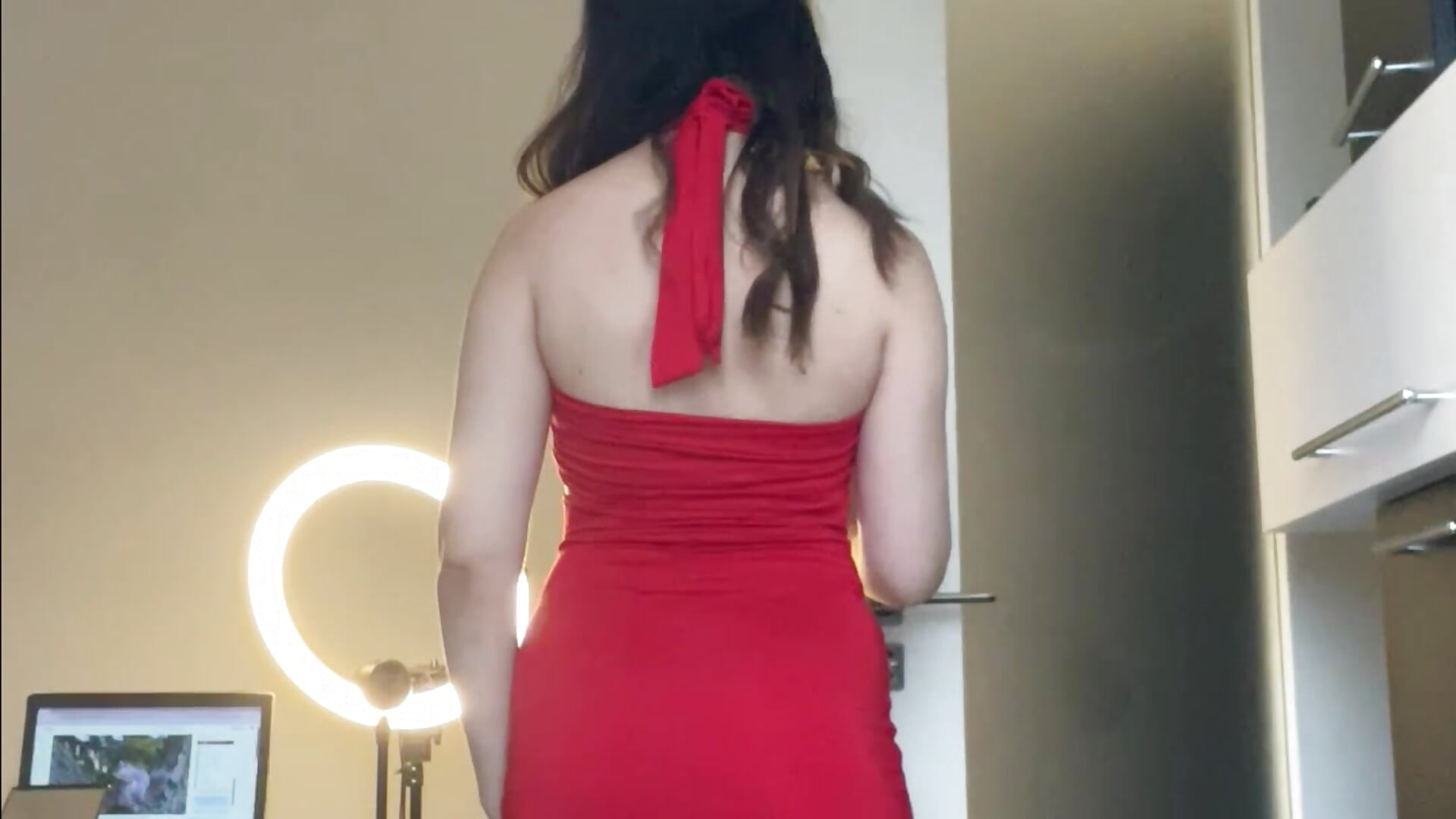 I'm wearing a red dress and high black heels - video by CurlyLara