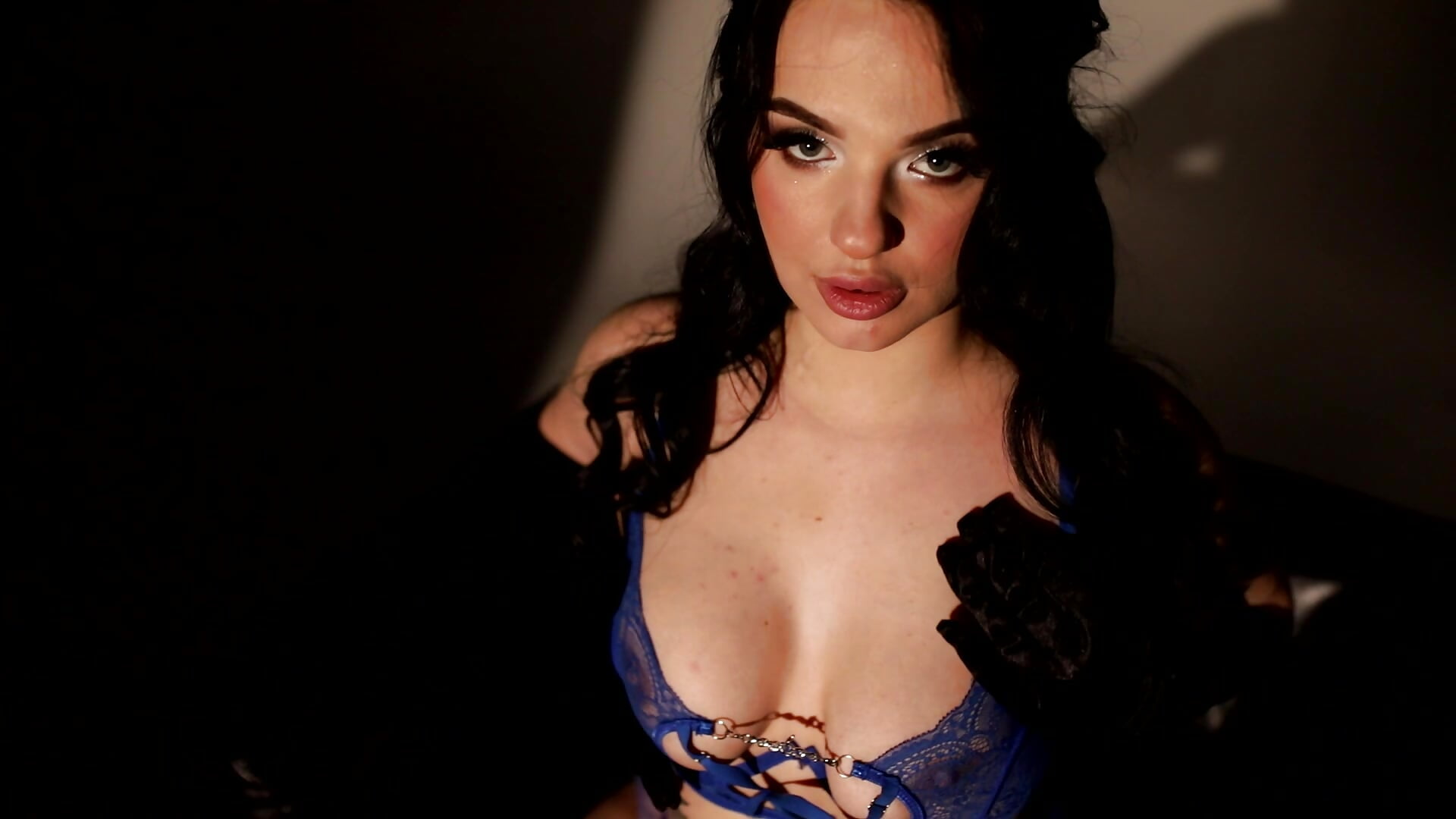 Velvet gloves and luxurious blue lingerie