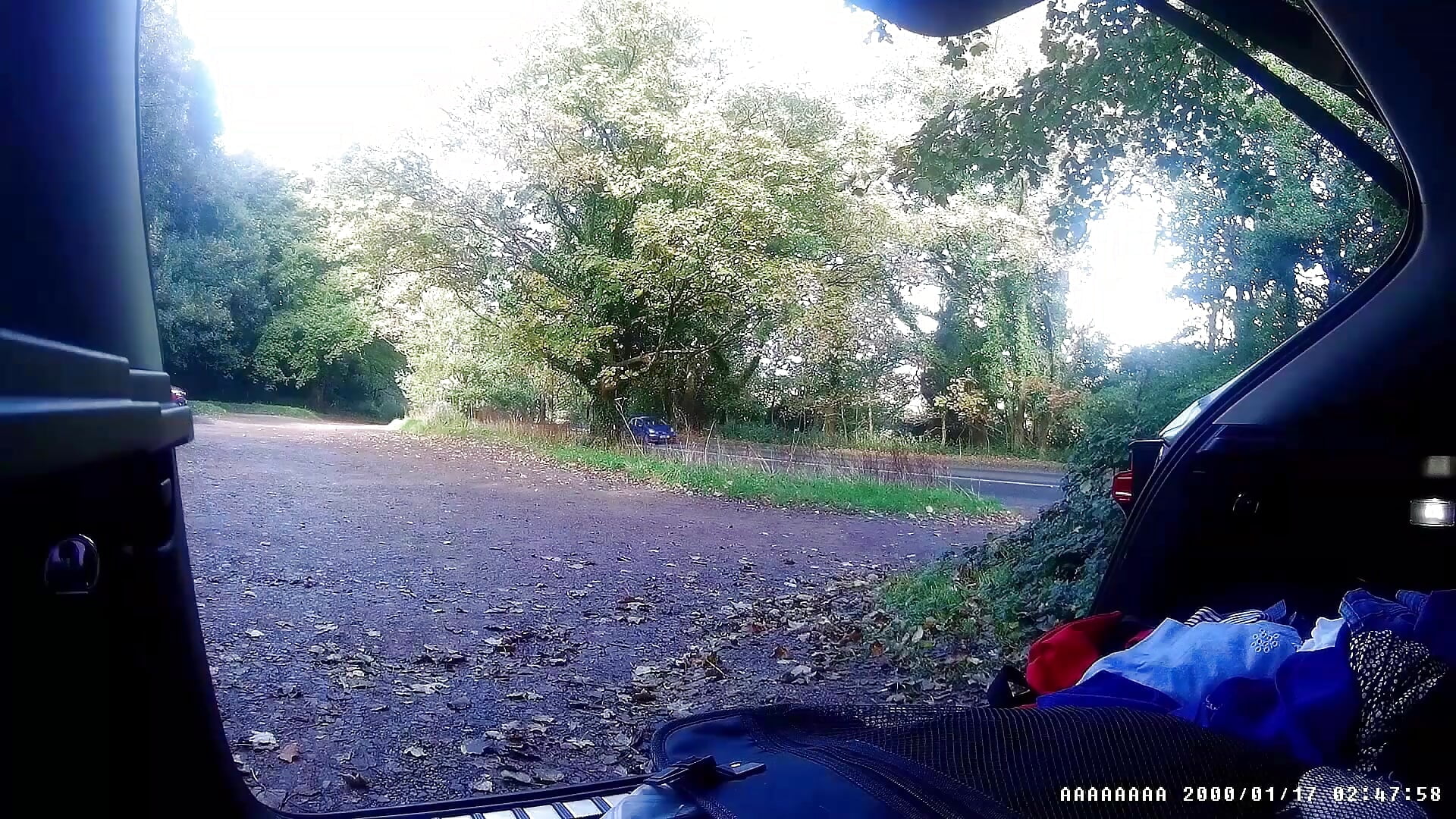 Getting changed and playing a little in a public car park with cars driving past