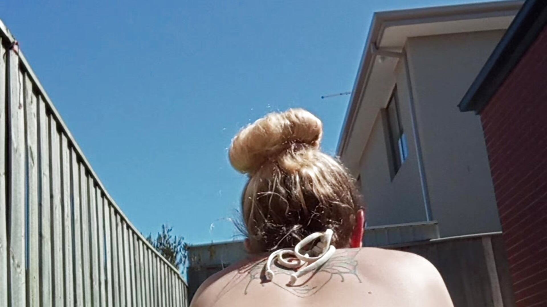 Ass/pussy Sunbaking with my toy up me.