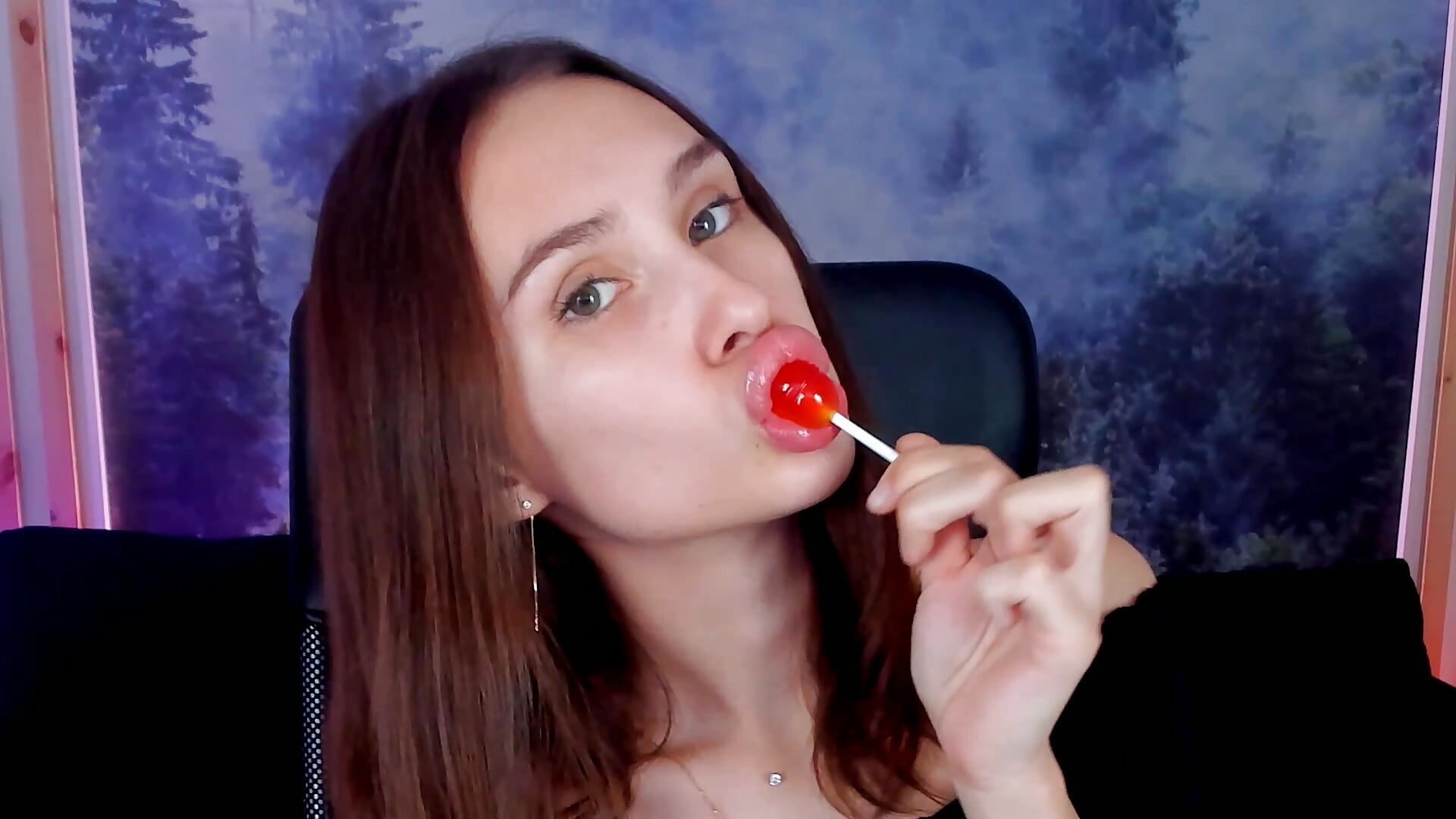 Sexually sucking on a lollipop