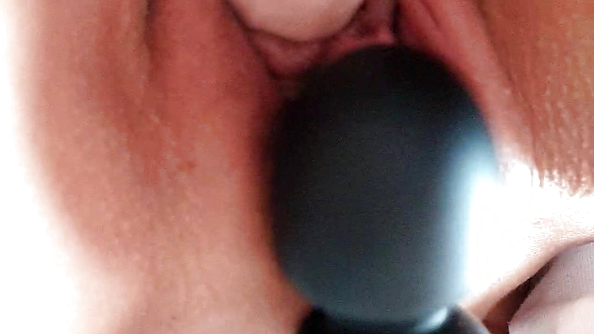 Dildo in pussy close up