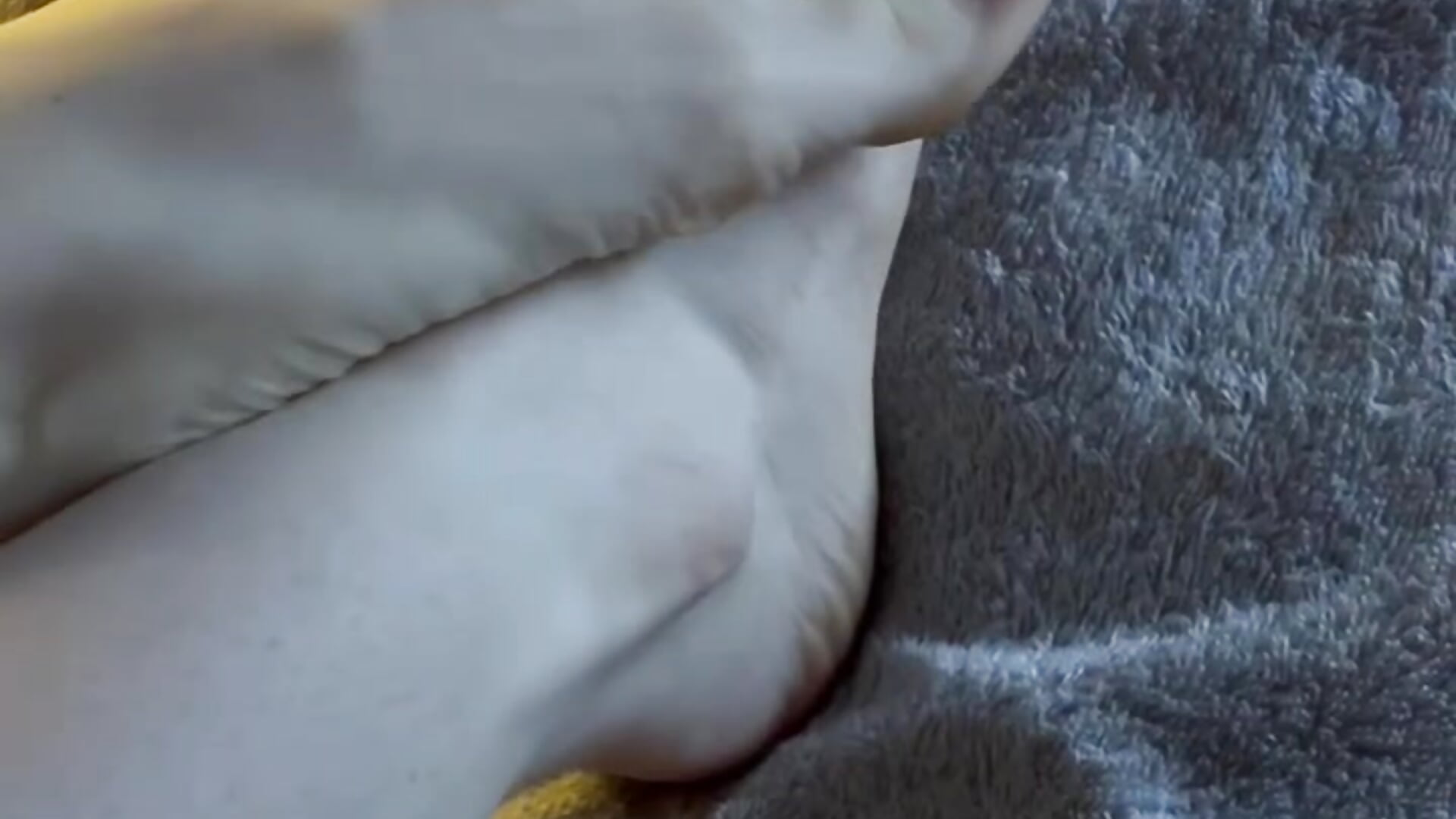 Gently smear the cream on my feet, toes and soles