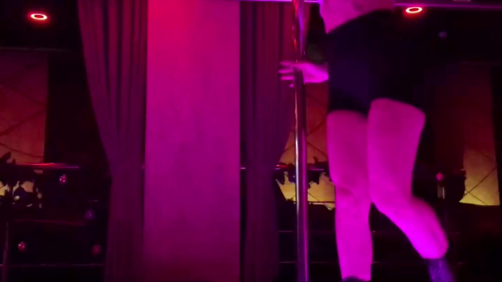 Sexy stripper on pylon