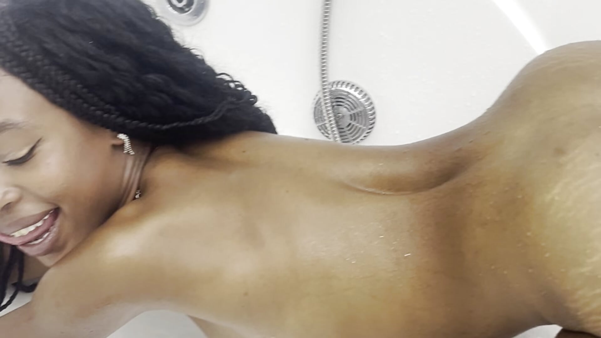 Playing naughty int he jacuzzi. spank/tits