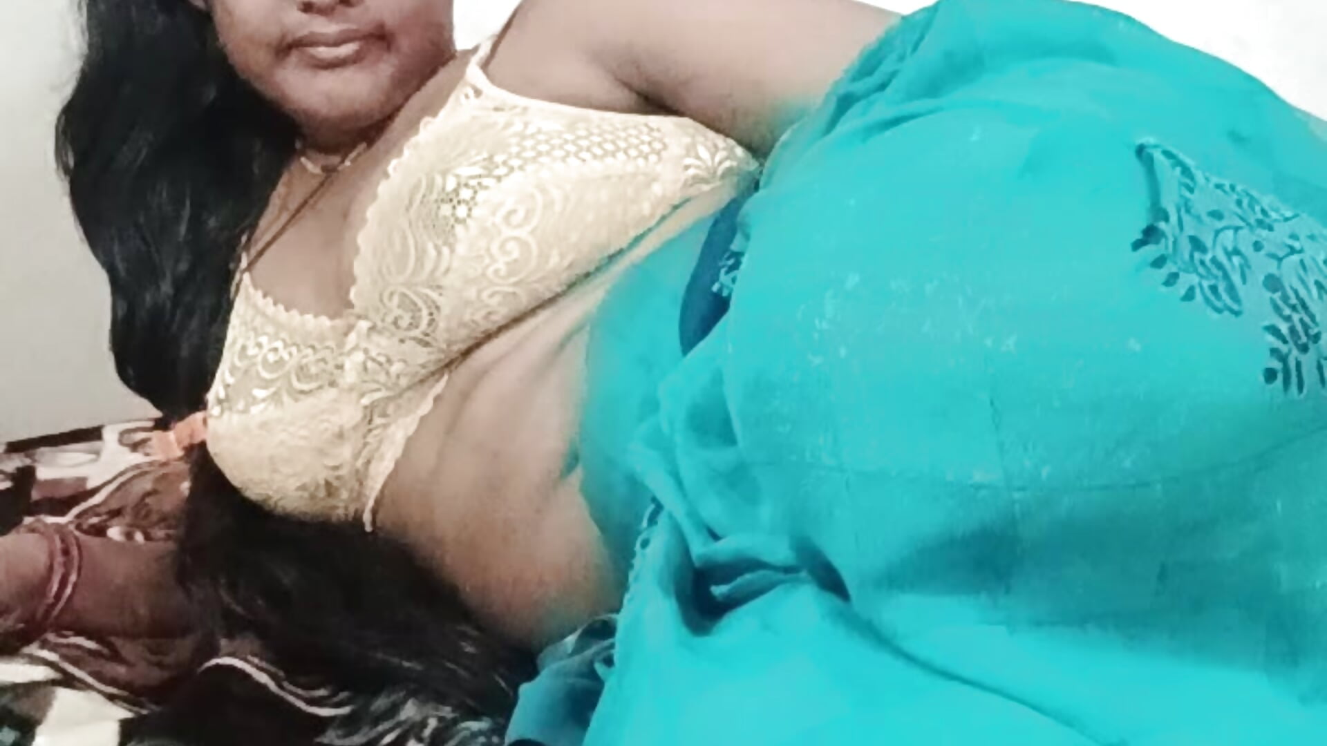 A beautiful girl is wearing a new saree and masturbating