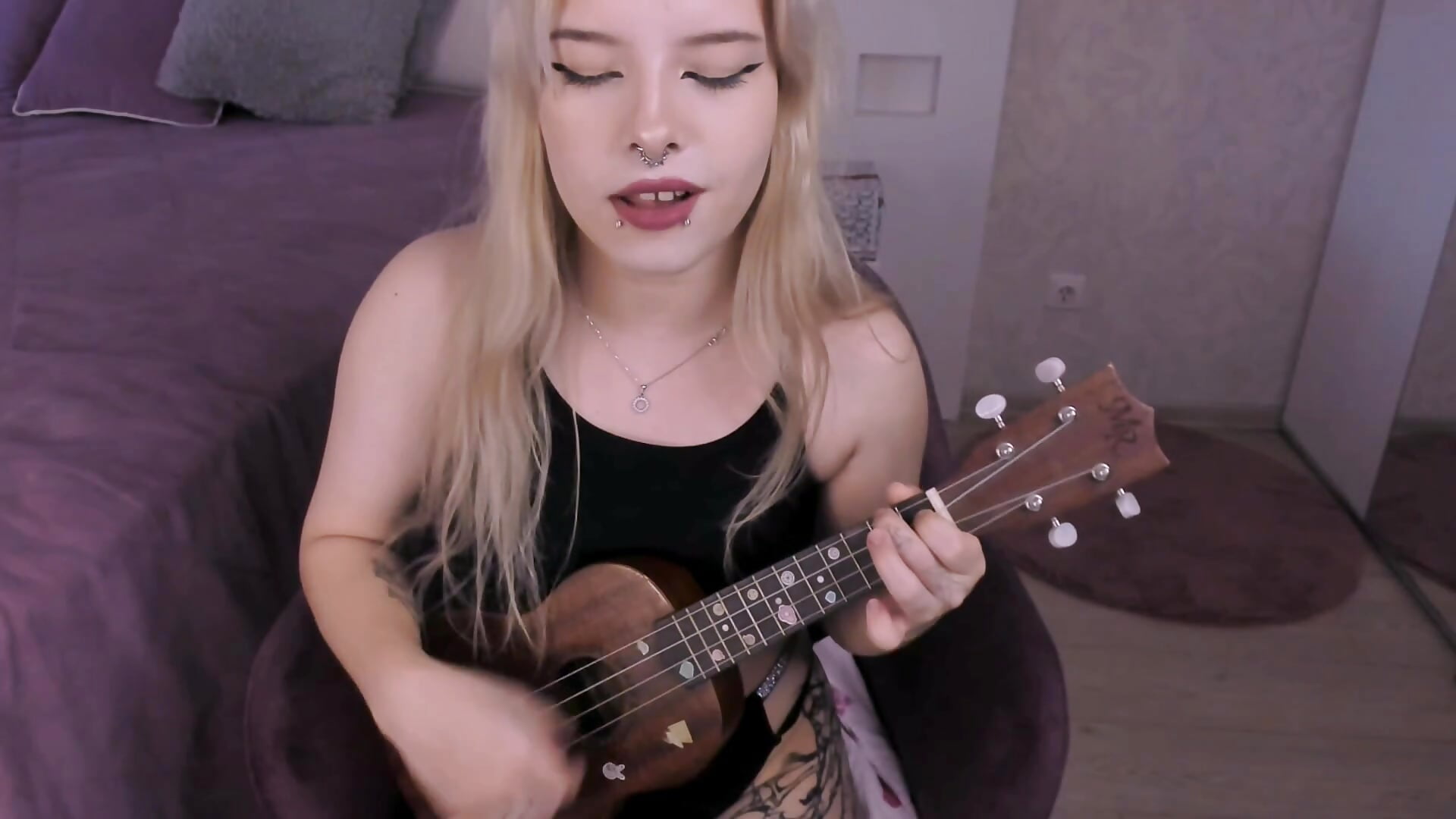 Playing on ukulele - video by Cuddly_Kitten cam model