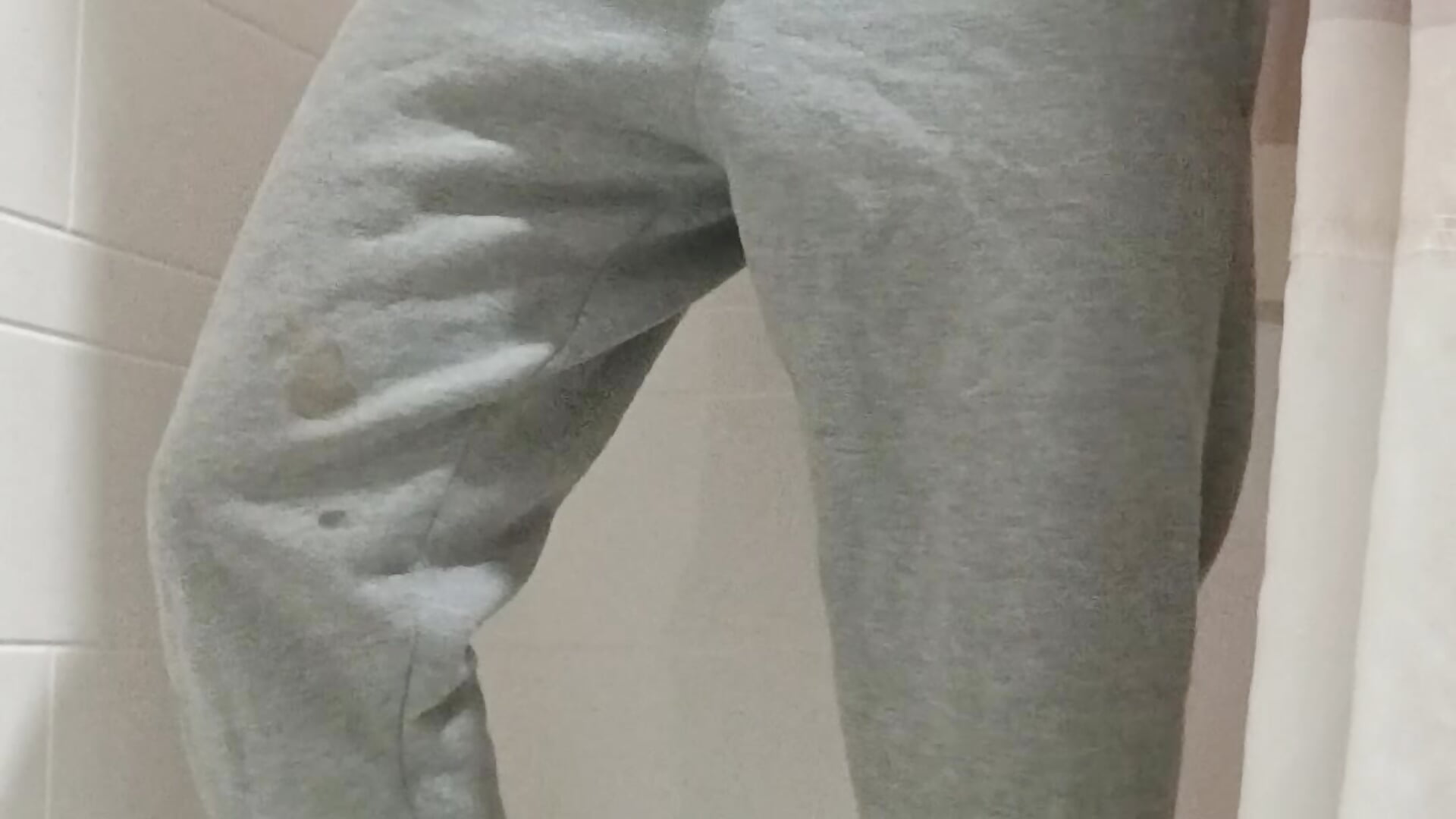 Squirting through sweatpants