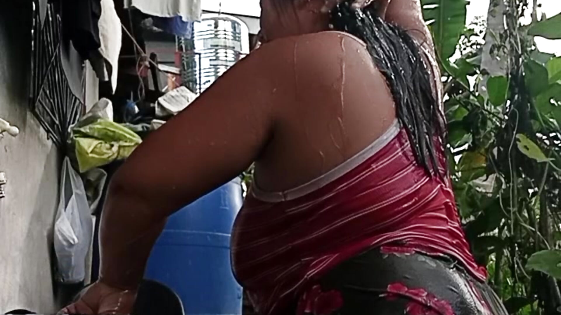 So hot taking a bath outside the house