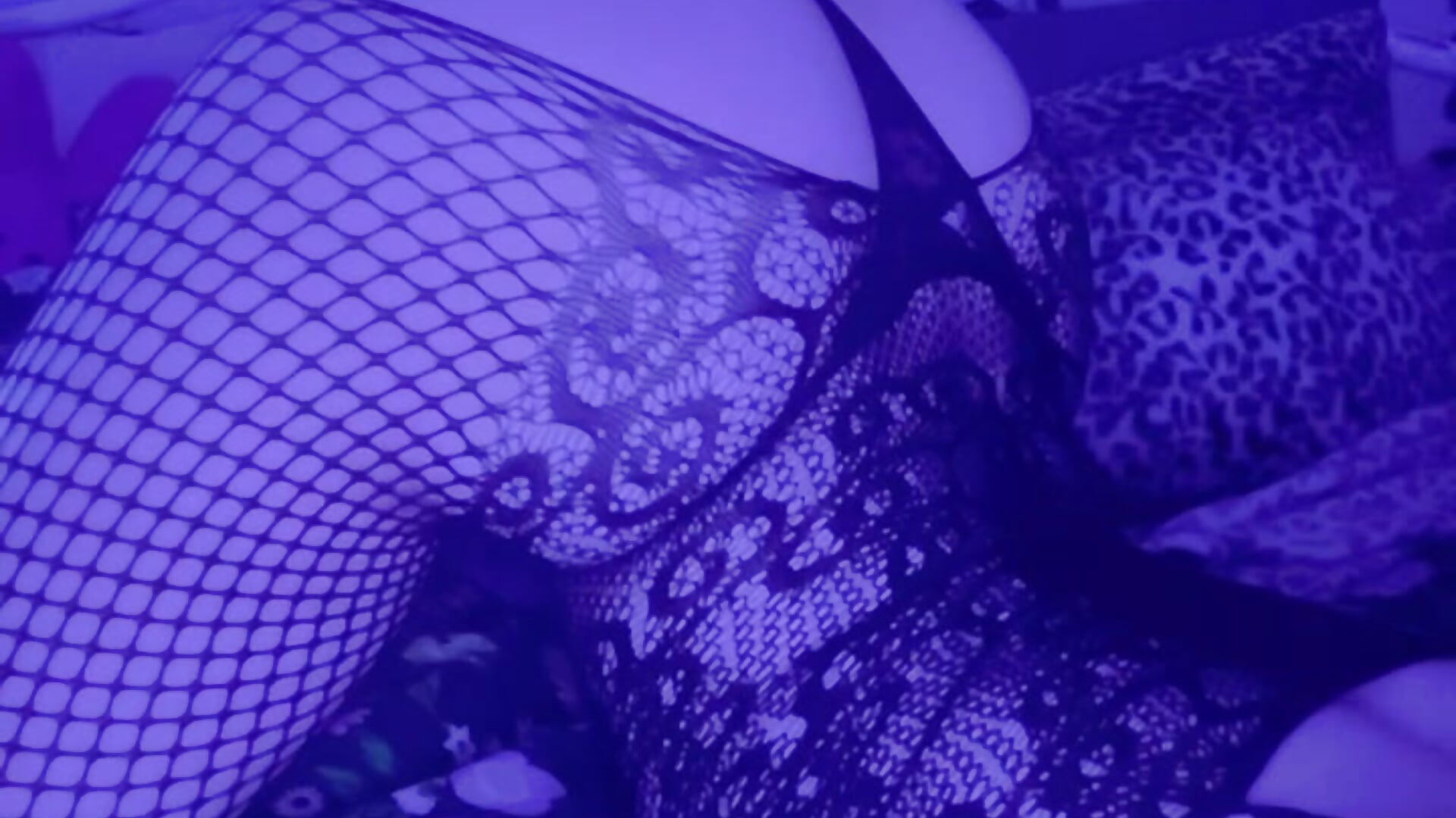 Arched in fishnet bodysuit