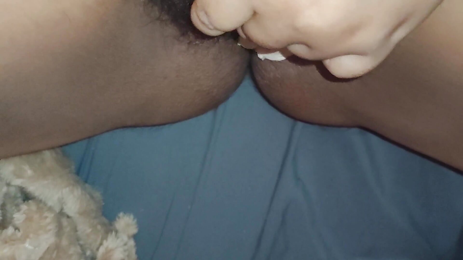 Playing with a vibrator on my hairy pussy.