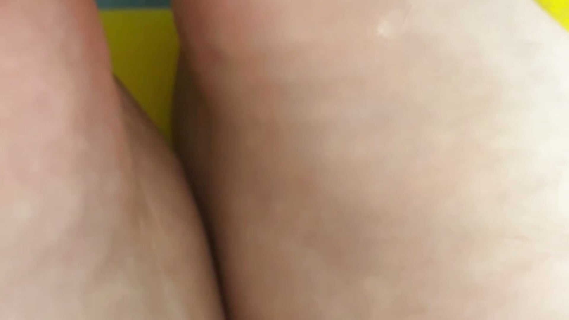The girl gently licks the guy's legs🦶