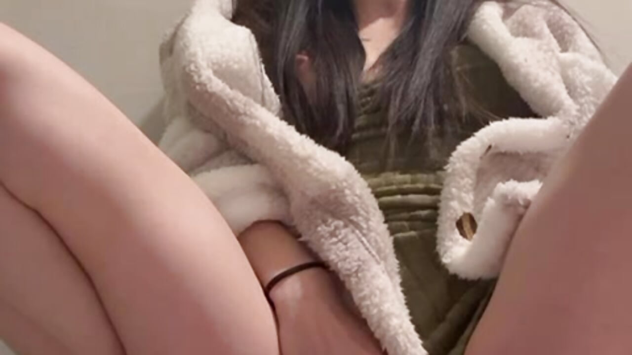 Squirting while masturbating in a public toilet