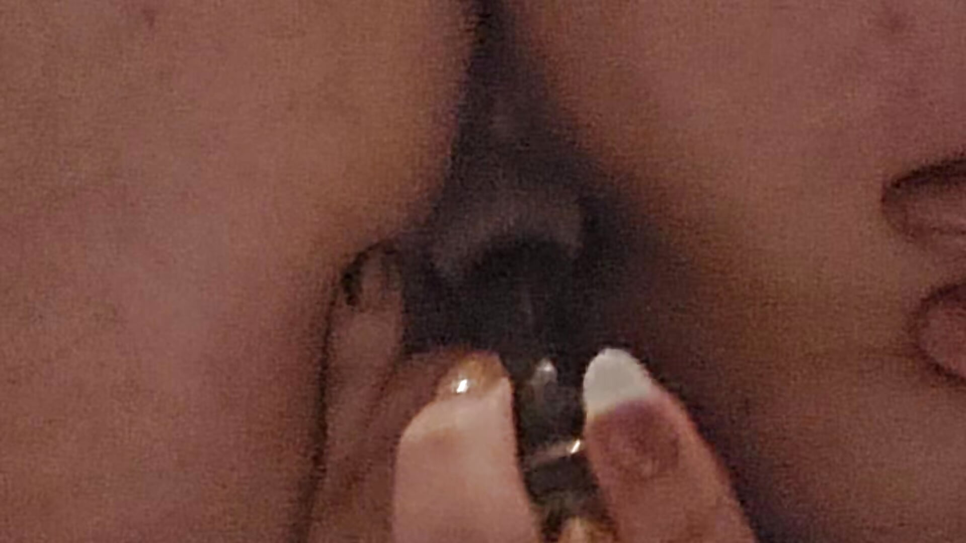 Gode anal gros plan