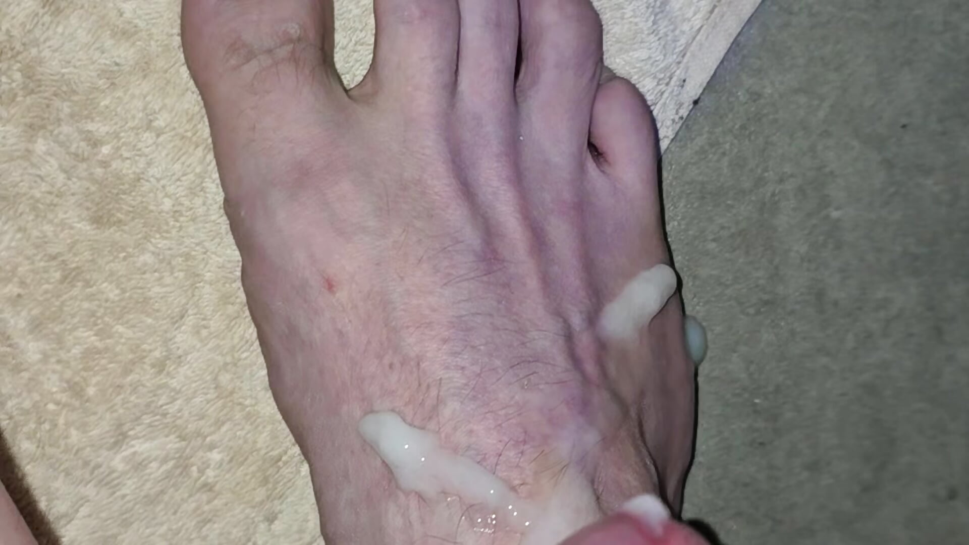 Foot cumshot