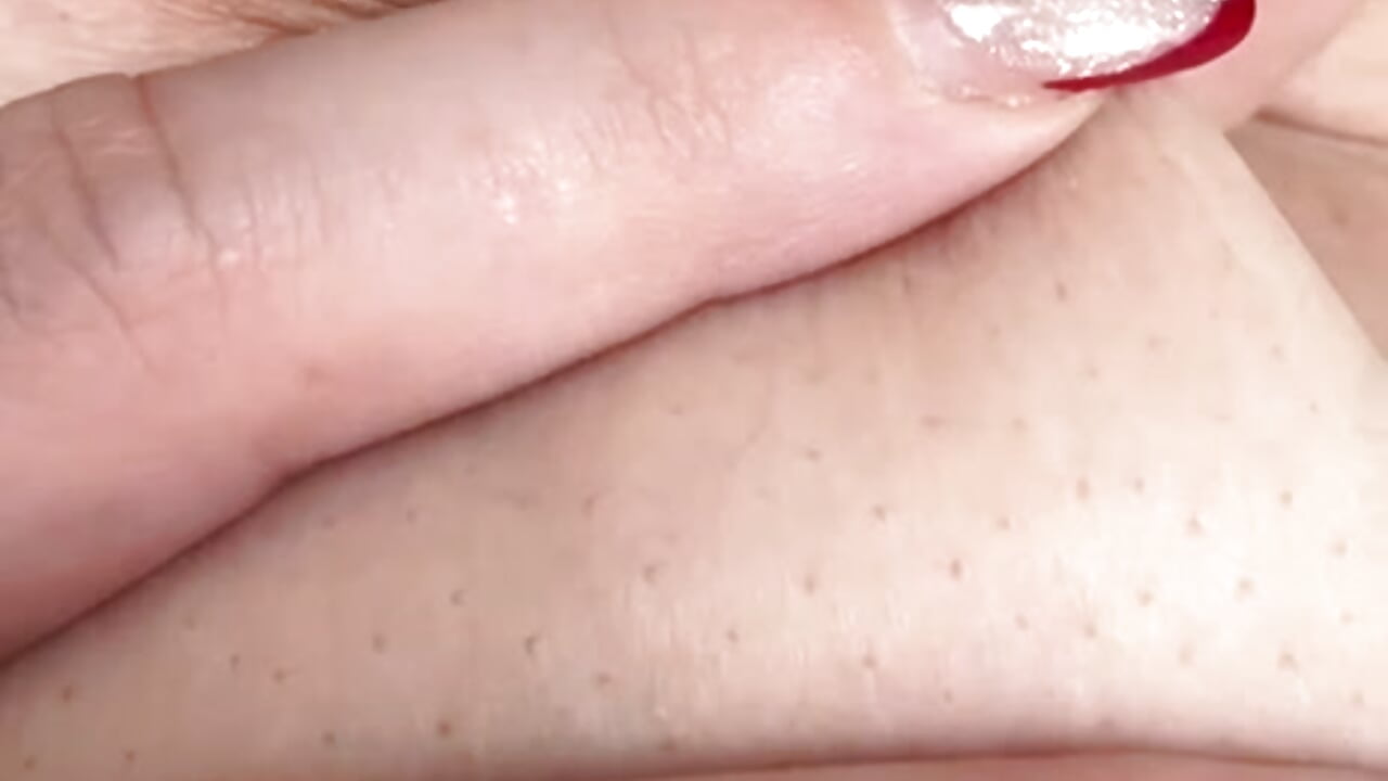 I'm naked and licking my nipples