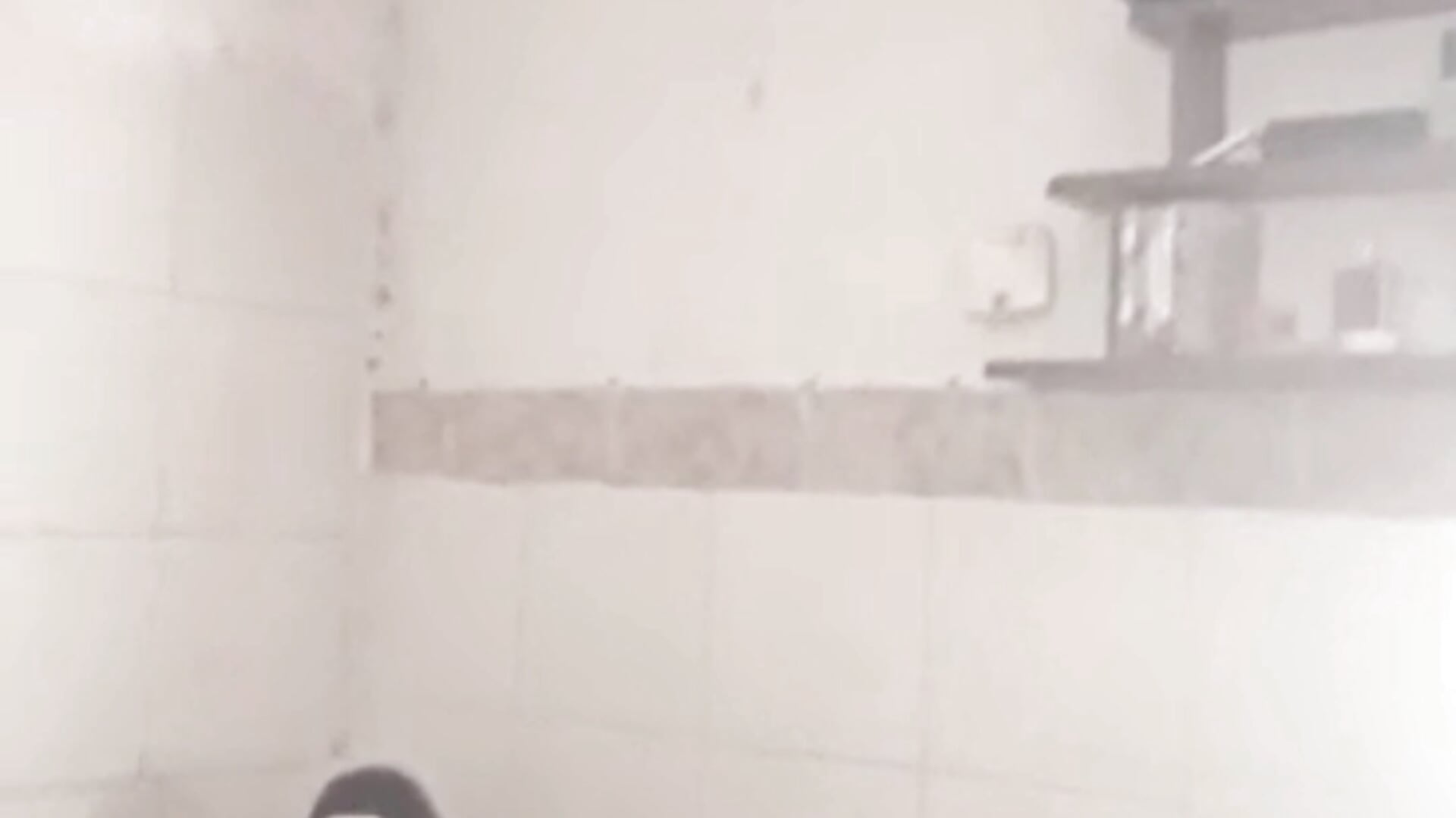 Masturbating