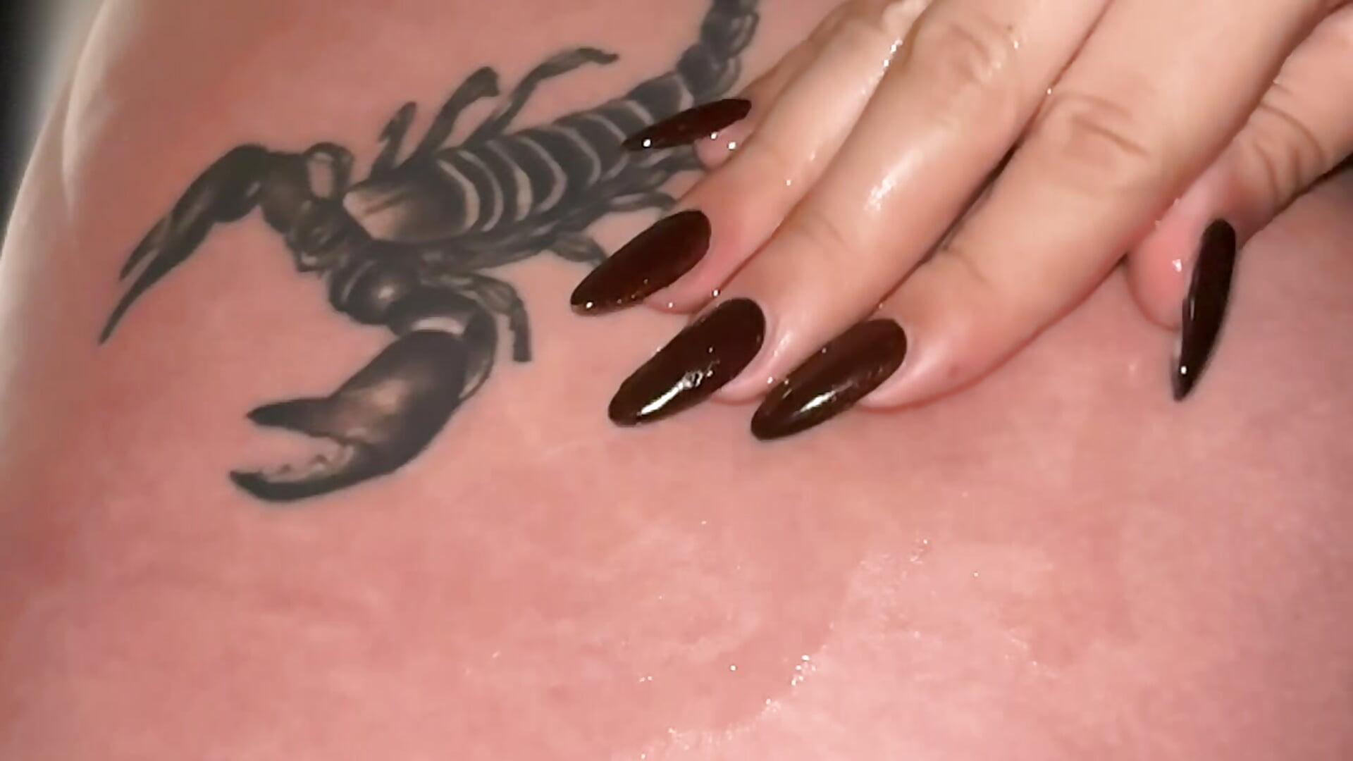 Stroking his scorpion... he seems calm, but we know he is dangerous. 🦂