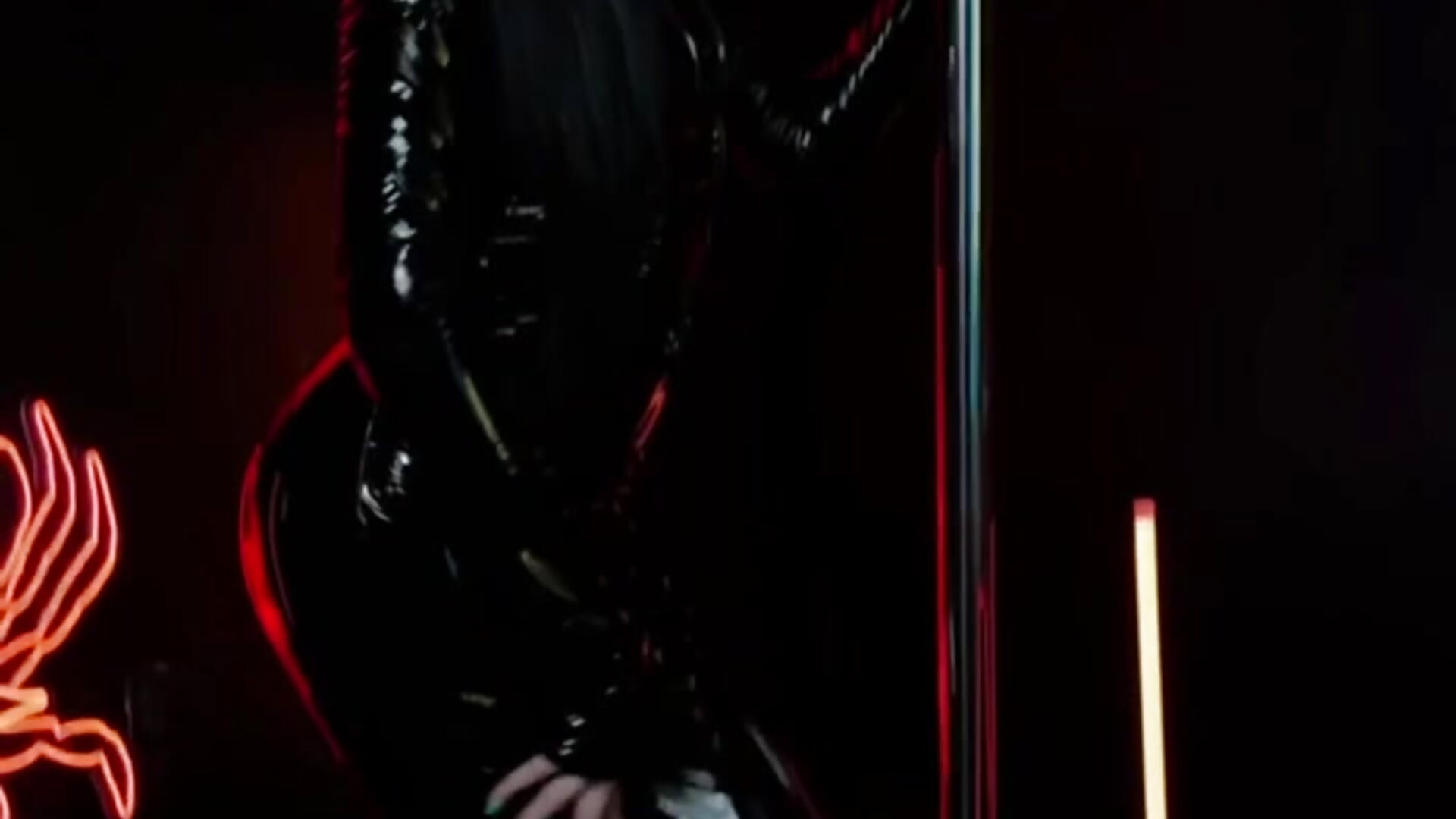 Latex catsuit and red high heels