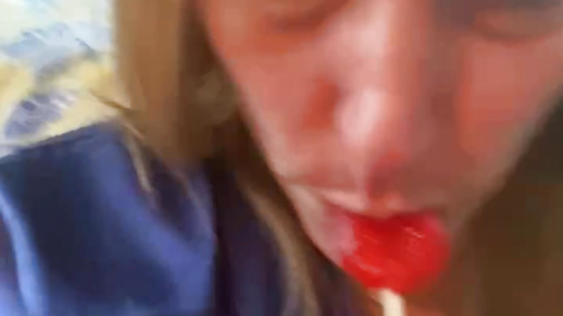 Tasting my cherry lollipop…