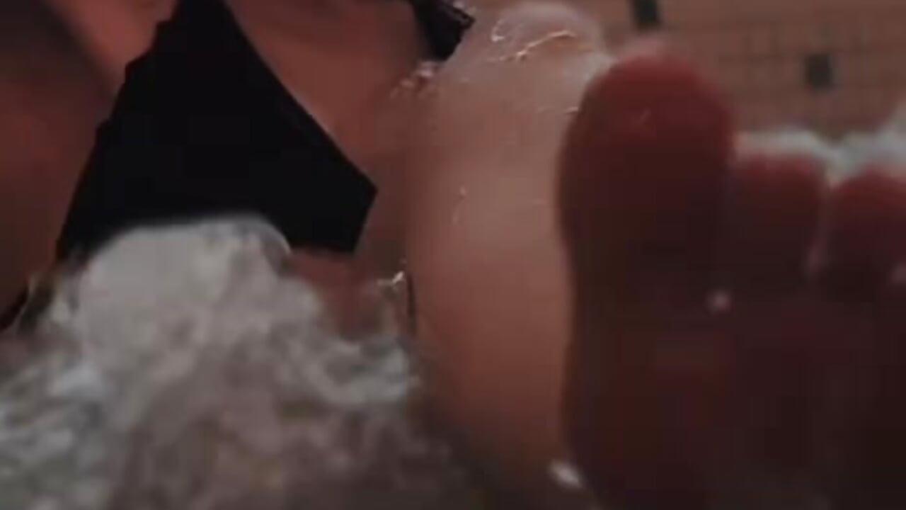 clear water dripping down mistress's butt and legs
