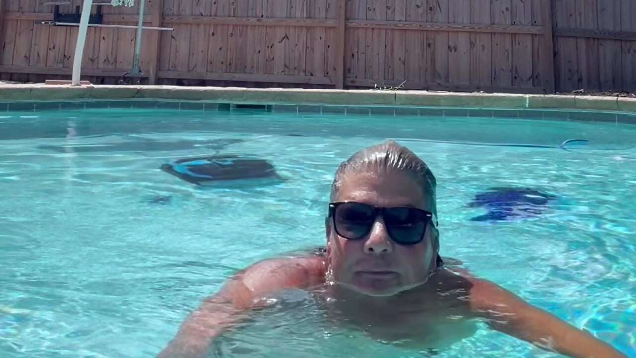 Being naughty in the pool and seeing if anyone is watching